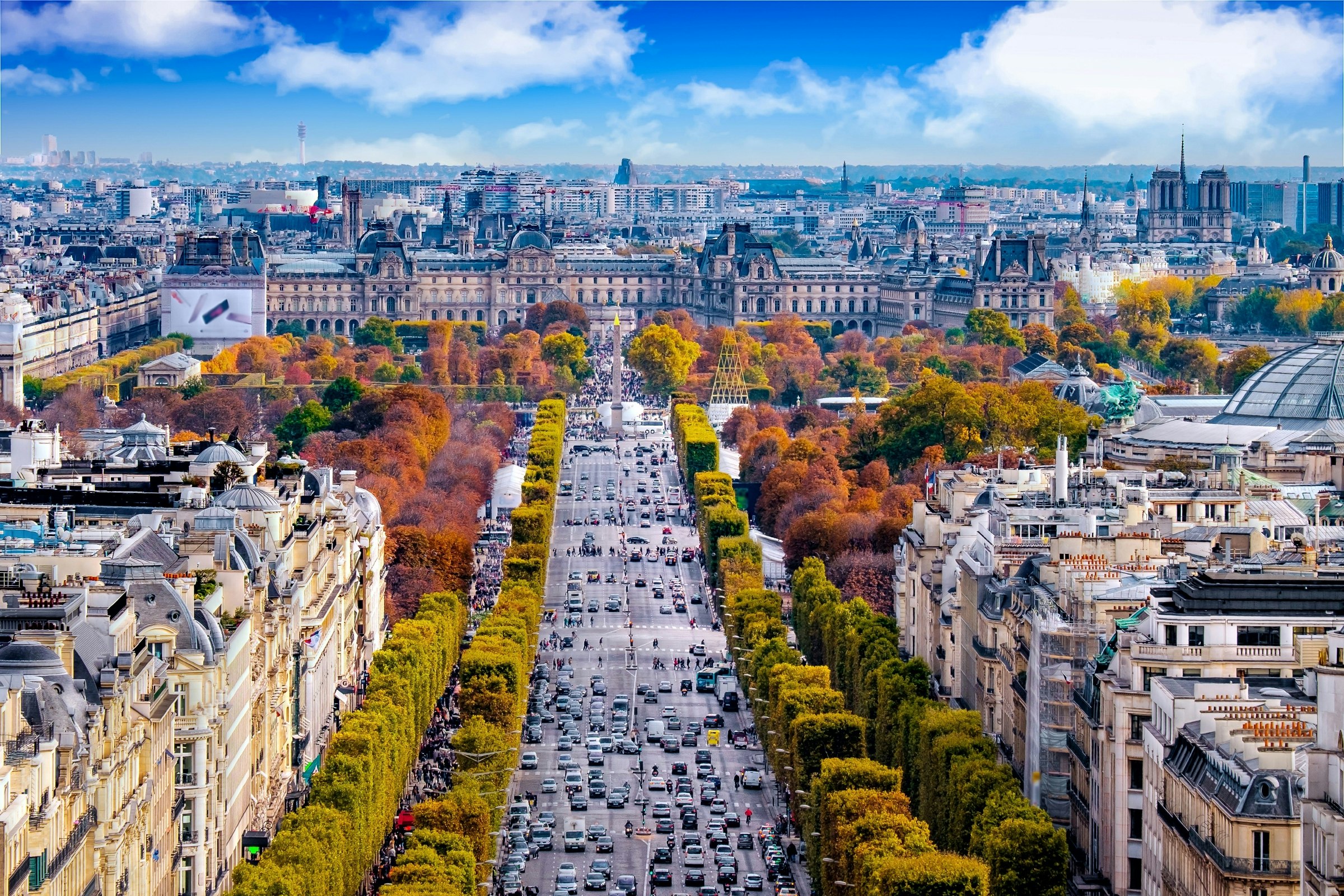 View from Arc de Triomphe. Blue sky with clouds in autumn.jpg
