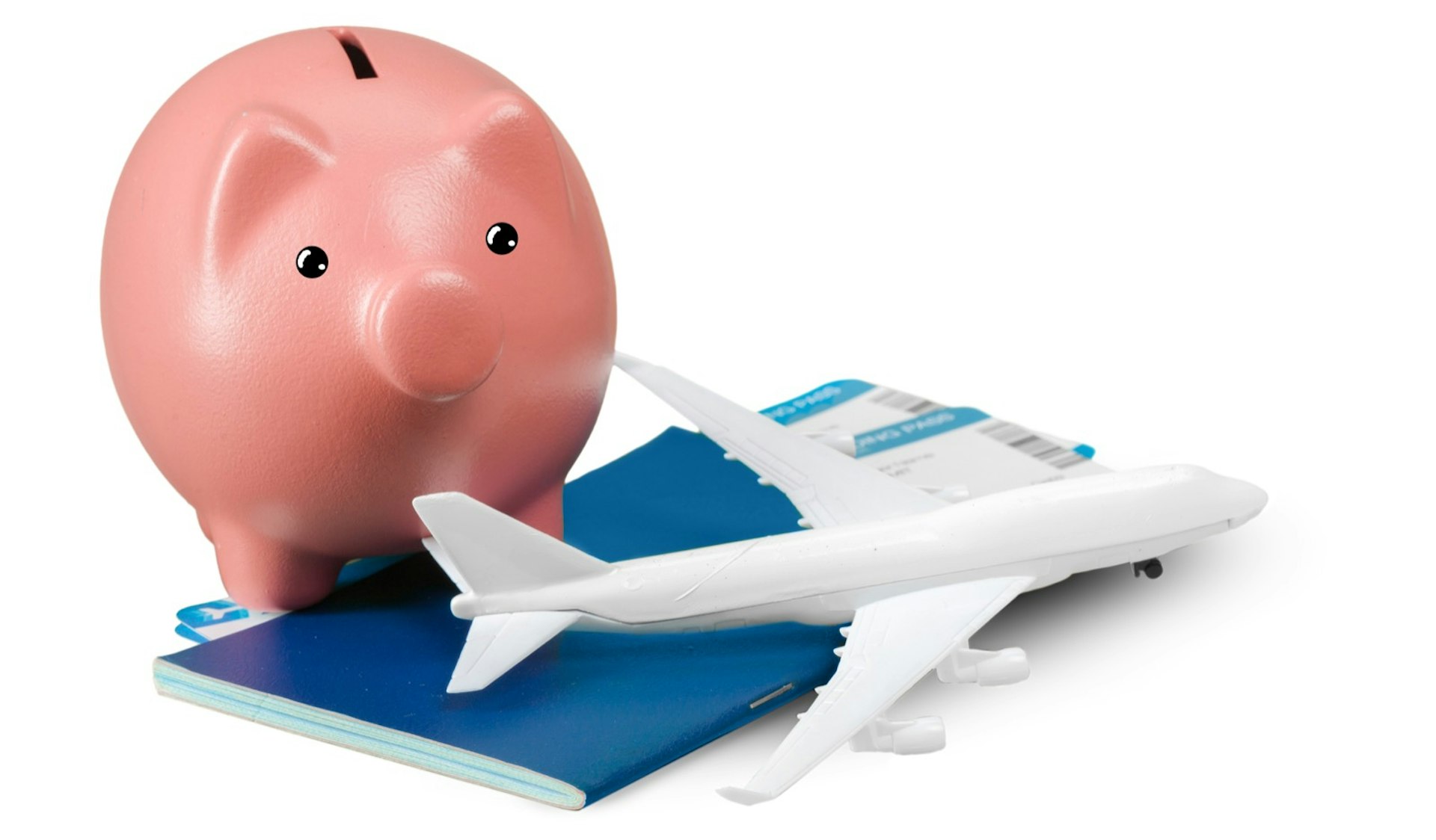 A piggy bank, toy airplane and travel documents sit on a white background; Do I need travel insurance?