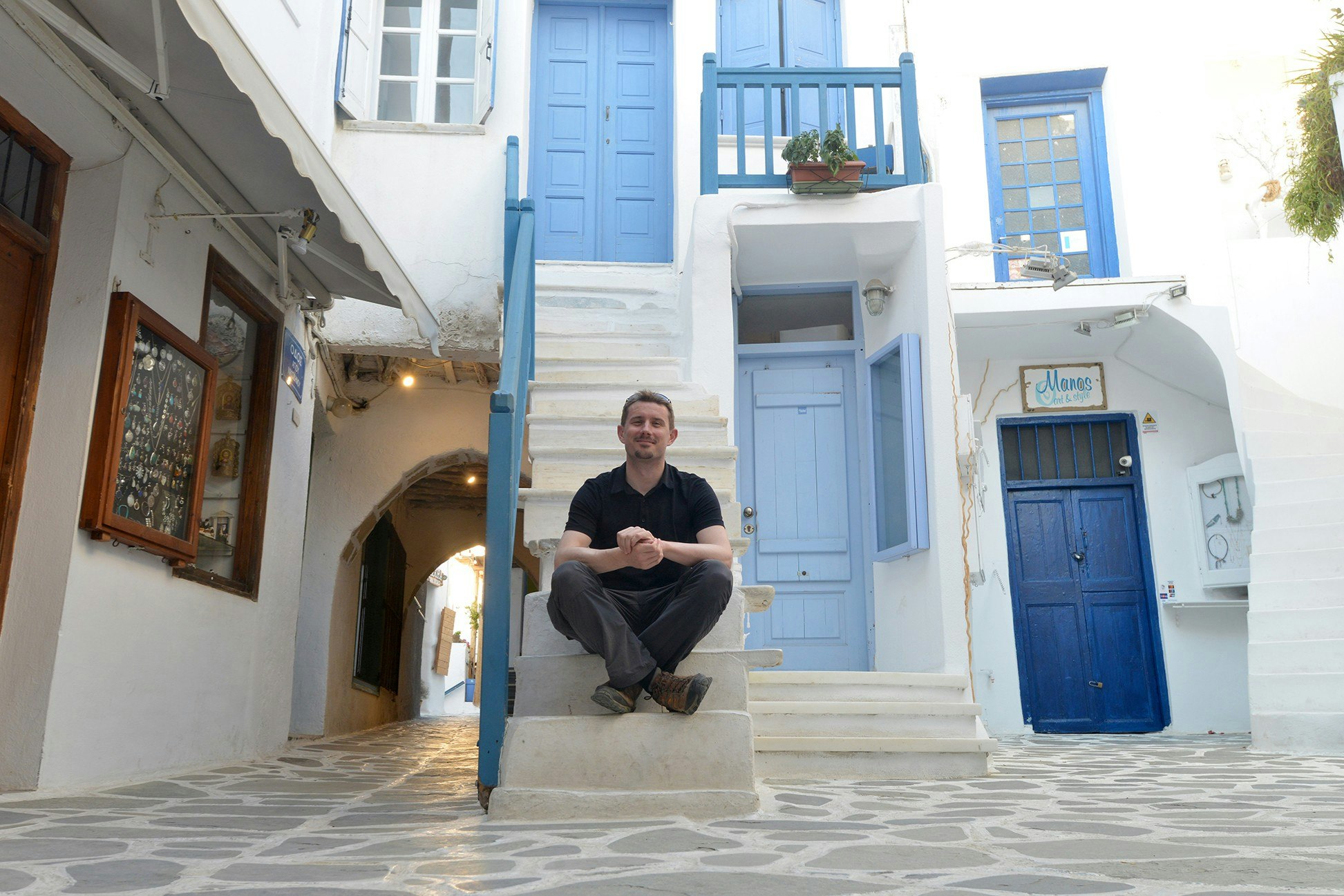 Pol O Conghaile sitting on a step in Naxos