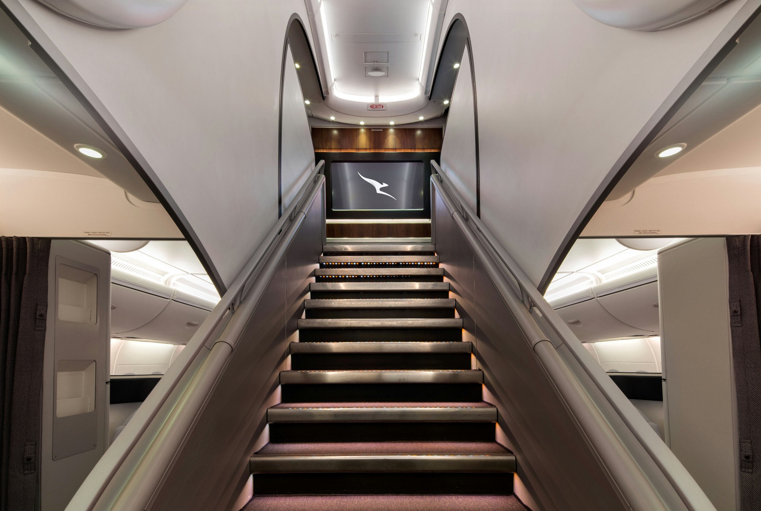 The staircase down to the lower deck on the Qantas A380 