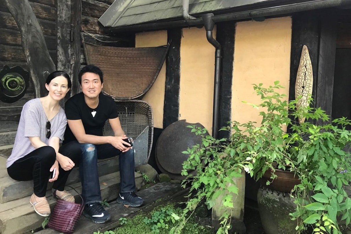 Writer Rebecca Milner and her husband outside a cafe in the mountains of Nagano