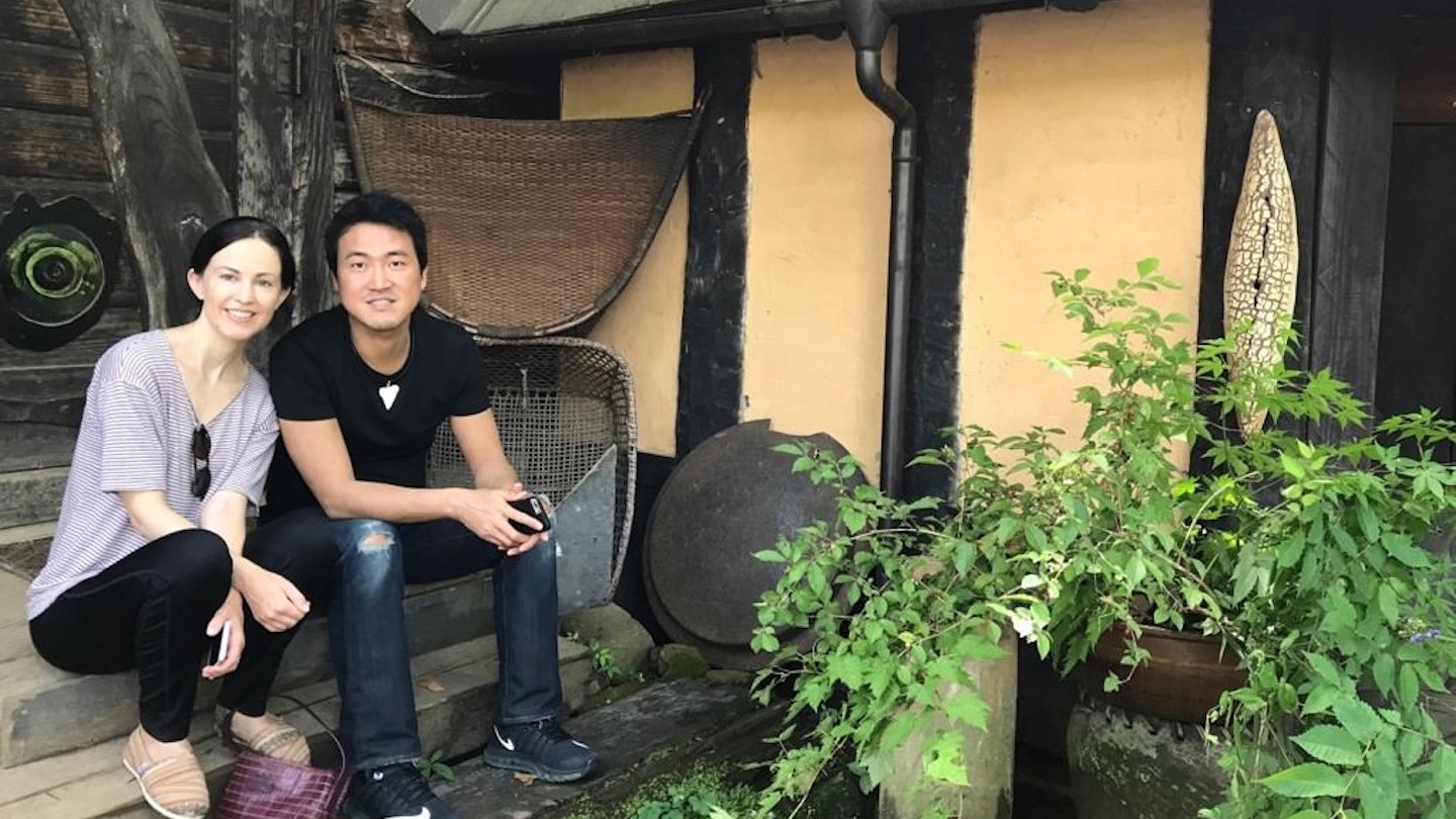 Writer Rebecca Milner and her husband outside a cafe in the mountains of Nagano