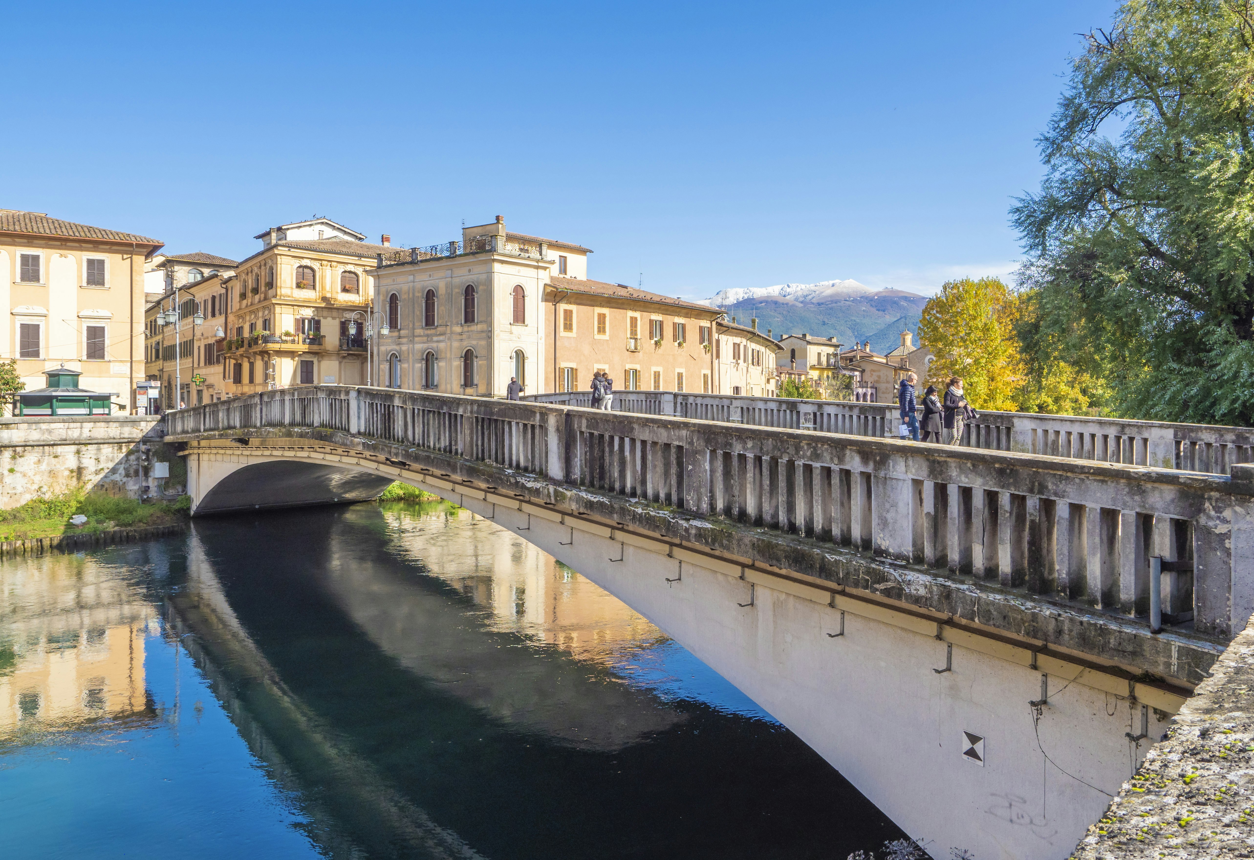 Rieti’s historic center with Mount Terminillo in the background and the river Velino and its bridge in the foreground. 