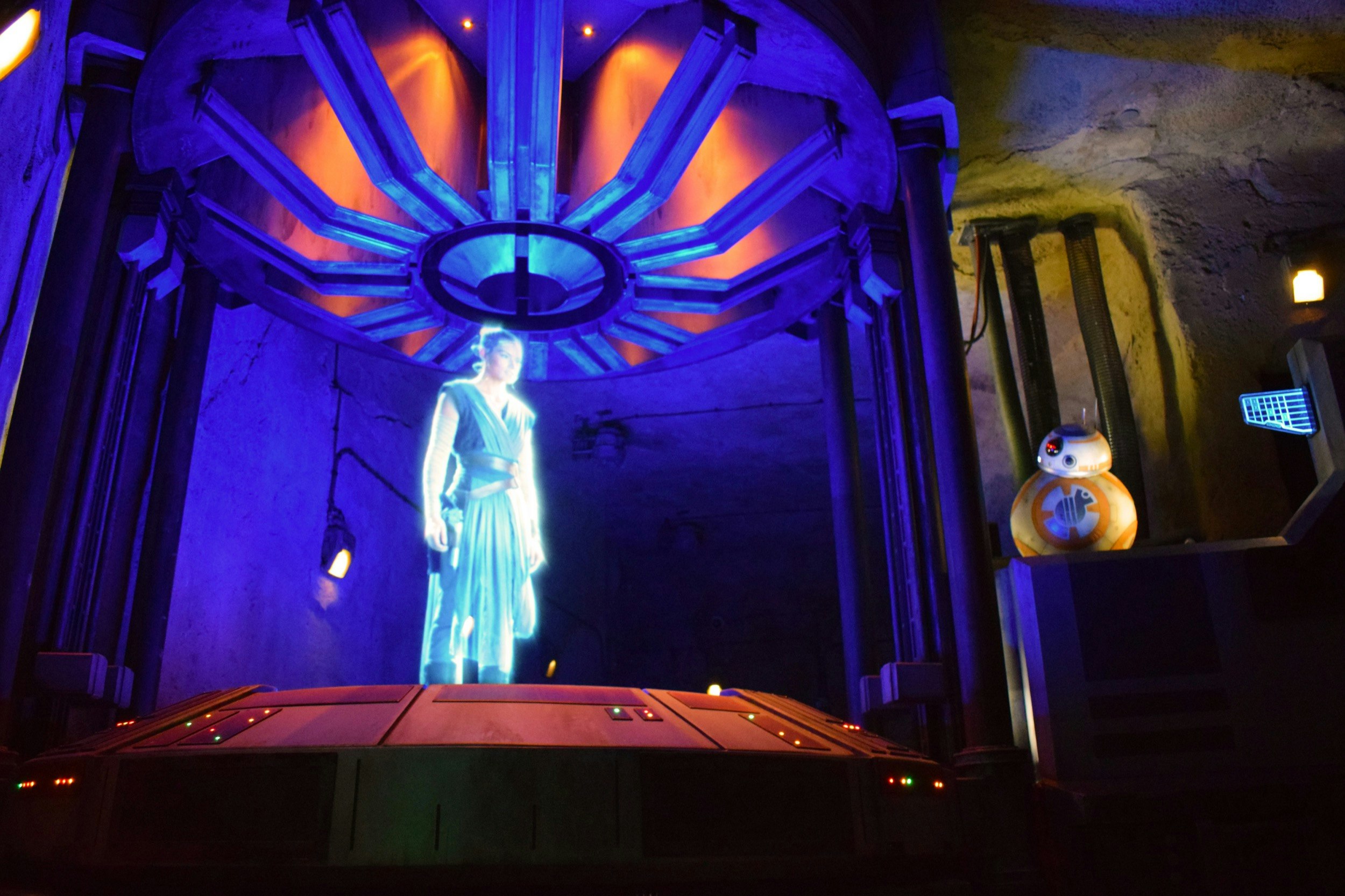 A hologram of an actress talks to riders on a Star Wars theme park ride at Walt Disney World in Florida