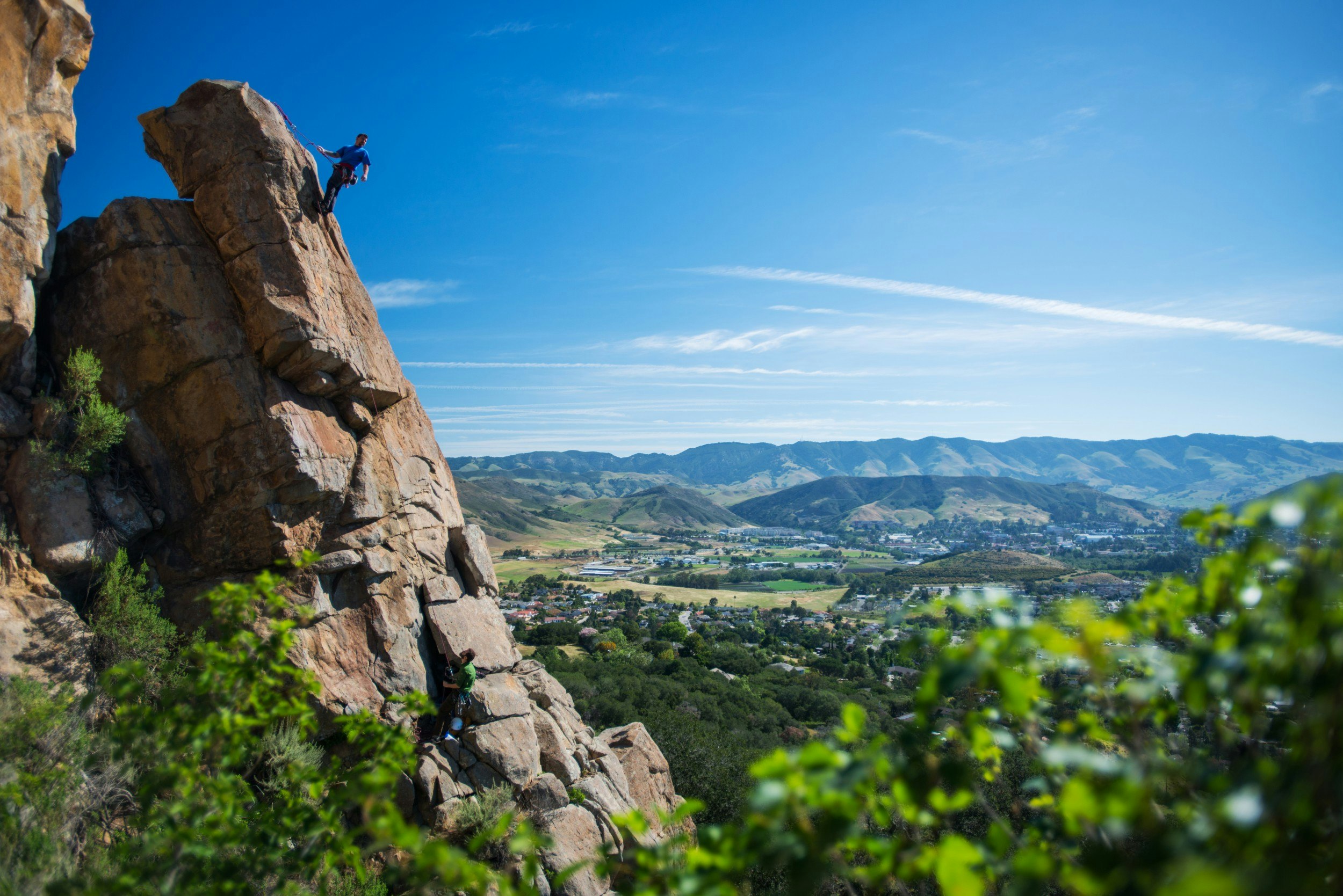 A man rock climbing in San Luis Obispo