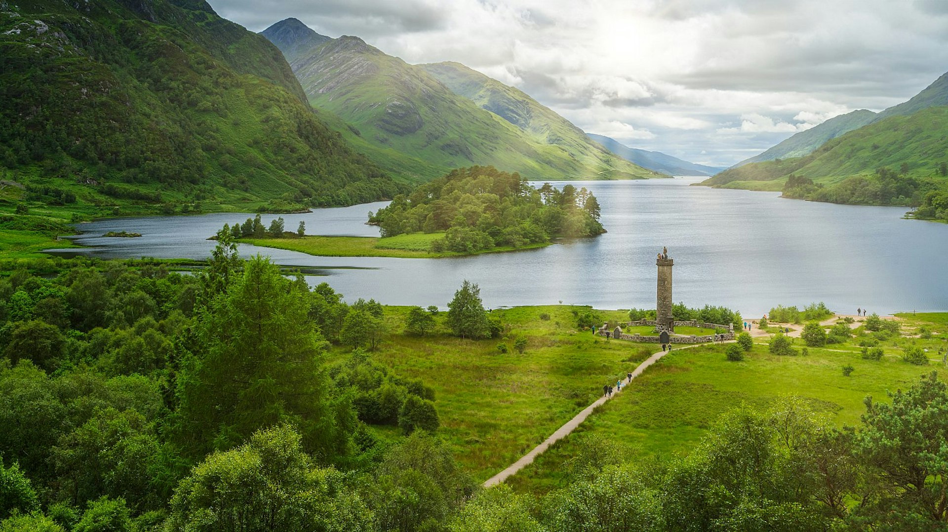 Glenfinnan Monument, amid greenery and mountains at the head of Loch Shiel in Inverness-shire, Scotland.