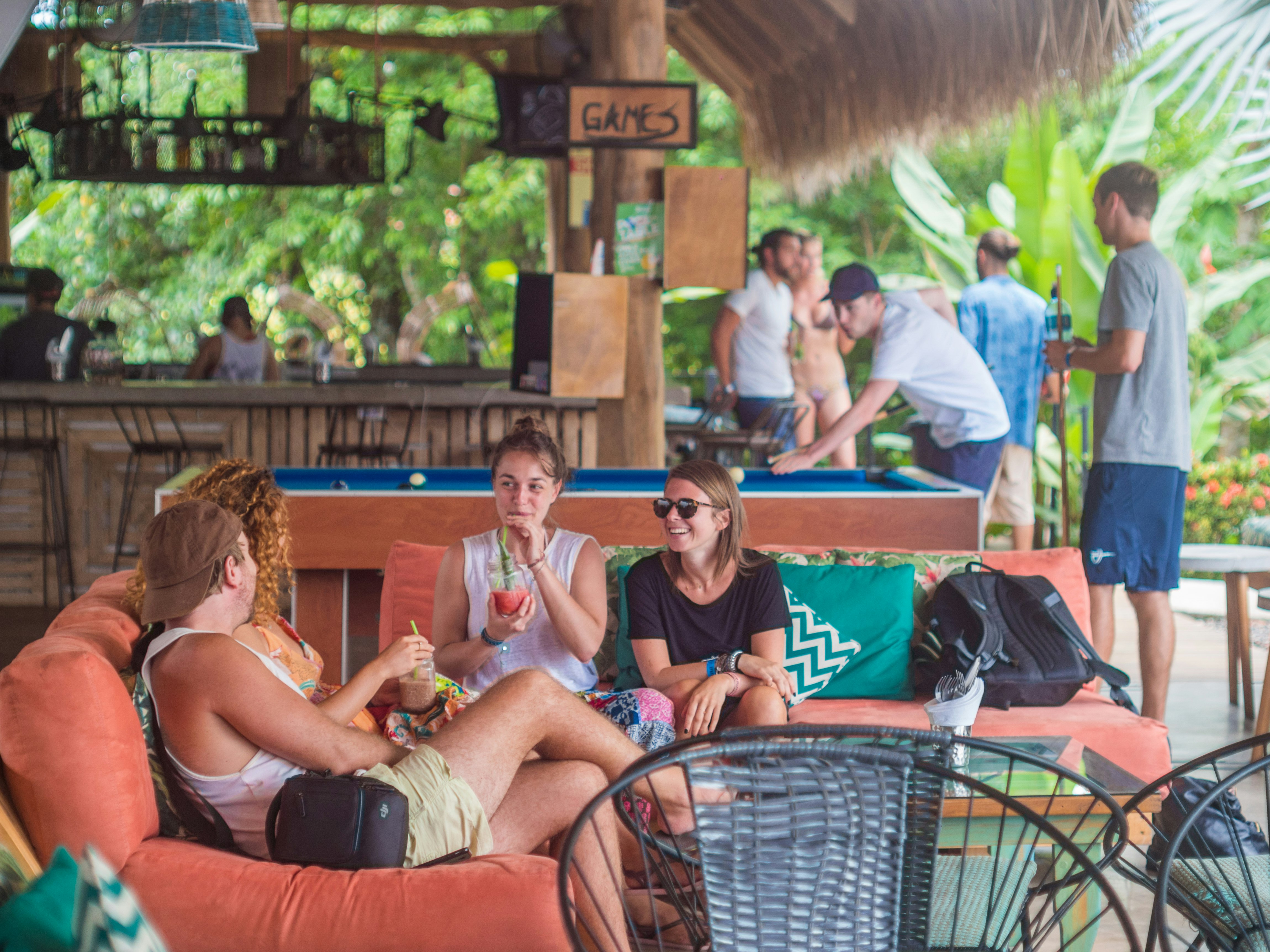 A group of young people laughing and relaxing 