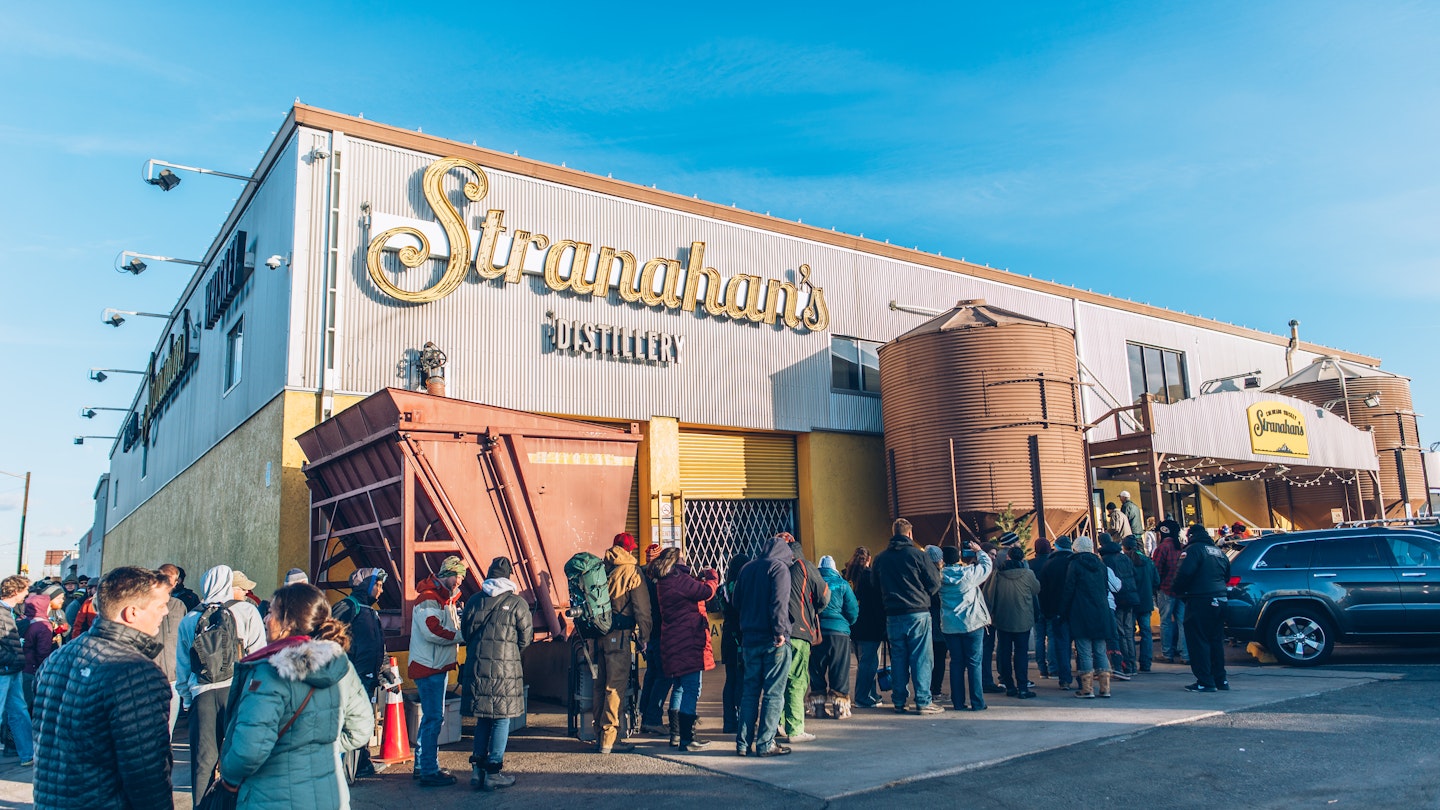 A long line of people wraps around Stranahan's distillery in Denver