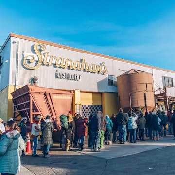A long line of people wraps around Stranahan's distillery in Denver