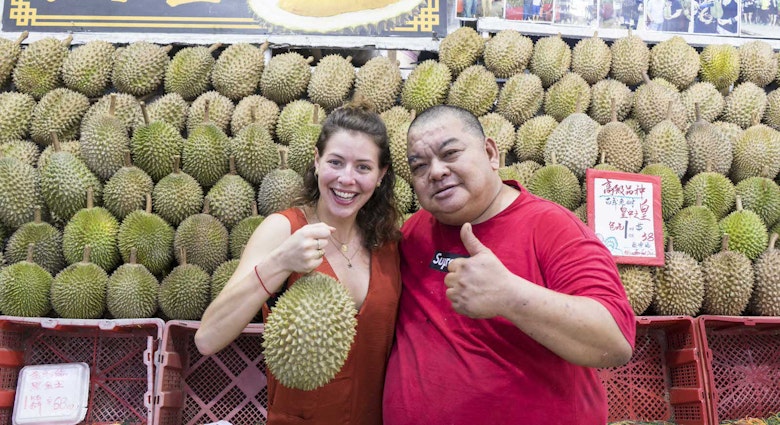 Sofia with durian vendor.jpg