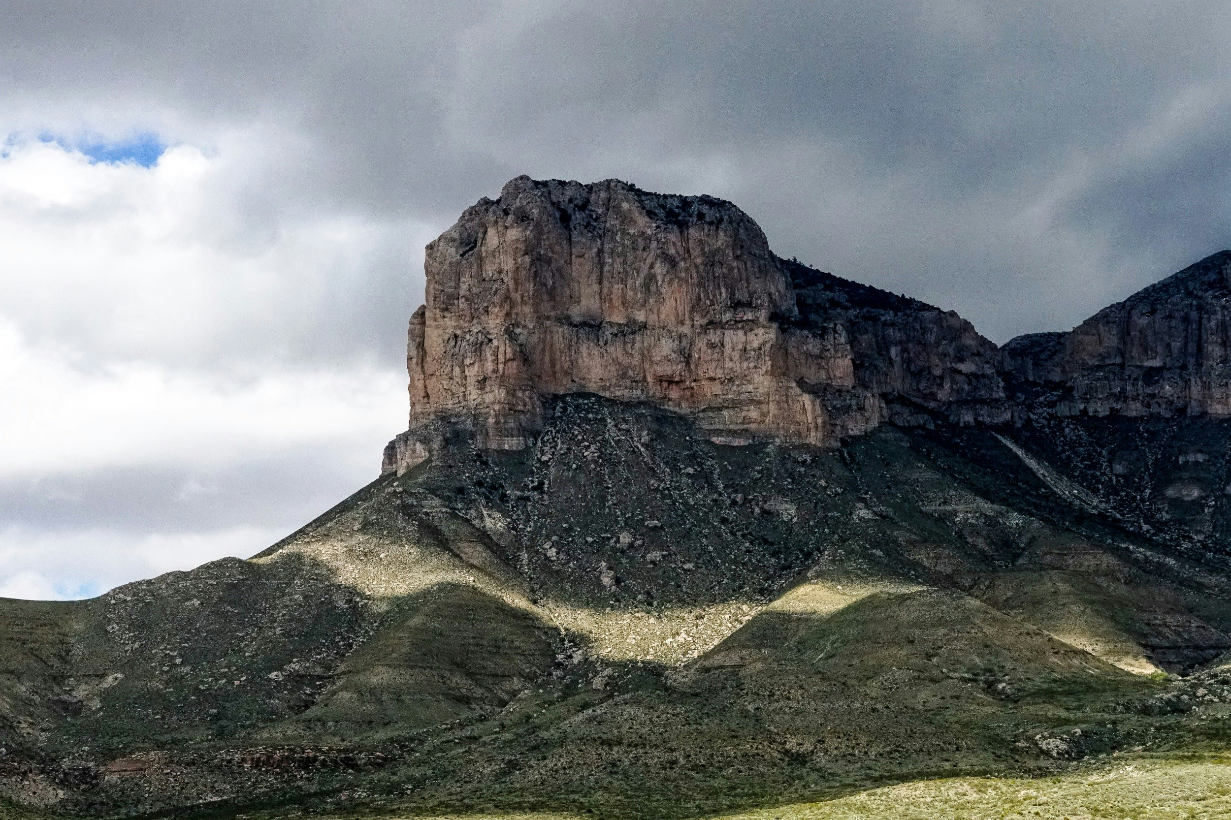 A mesa rises from lush surroundings in Guadeloupe Mountains National Park in Texas