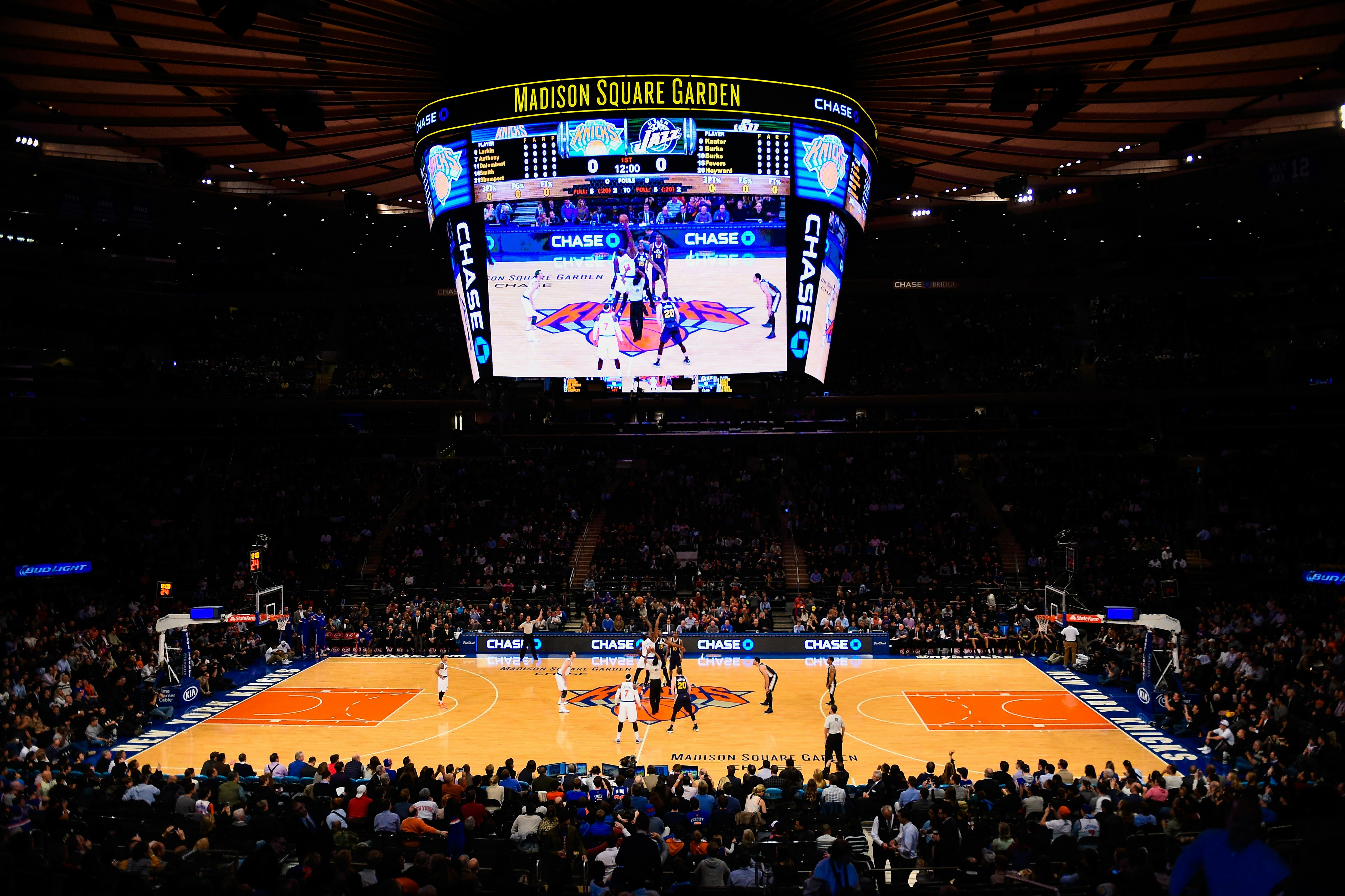 Sports fans watch a basketball game at Madison Square Garden in New York City.
