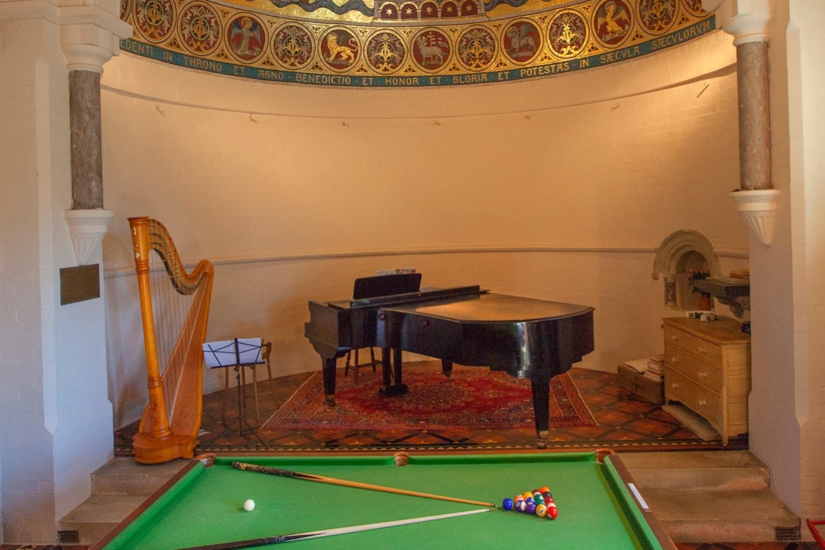 A grand piano, harp and snooker table at St Curigs Church