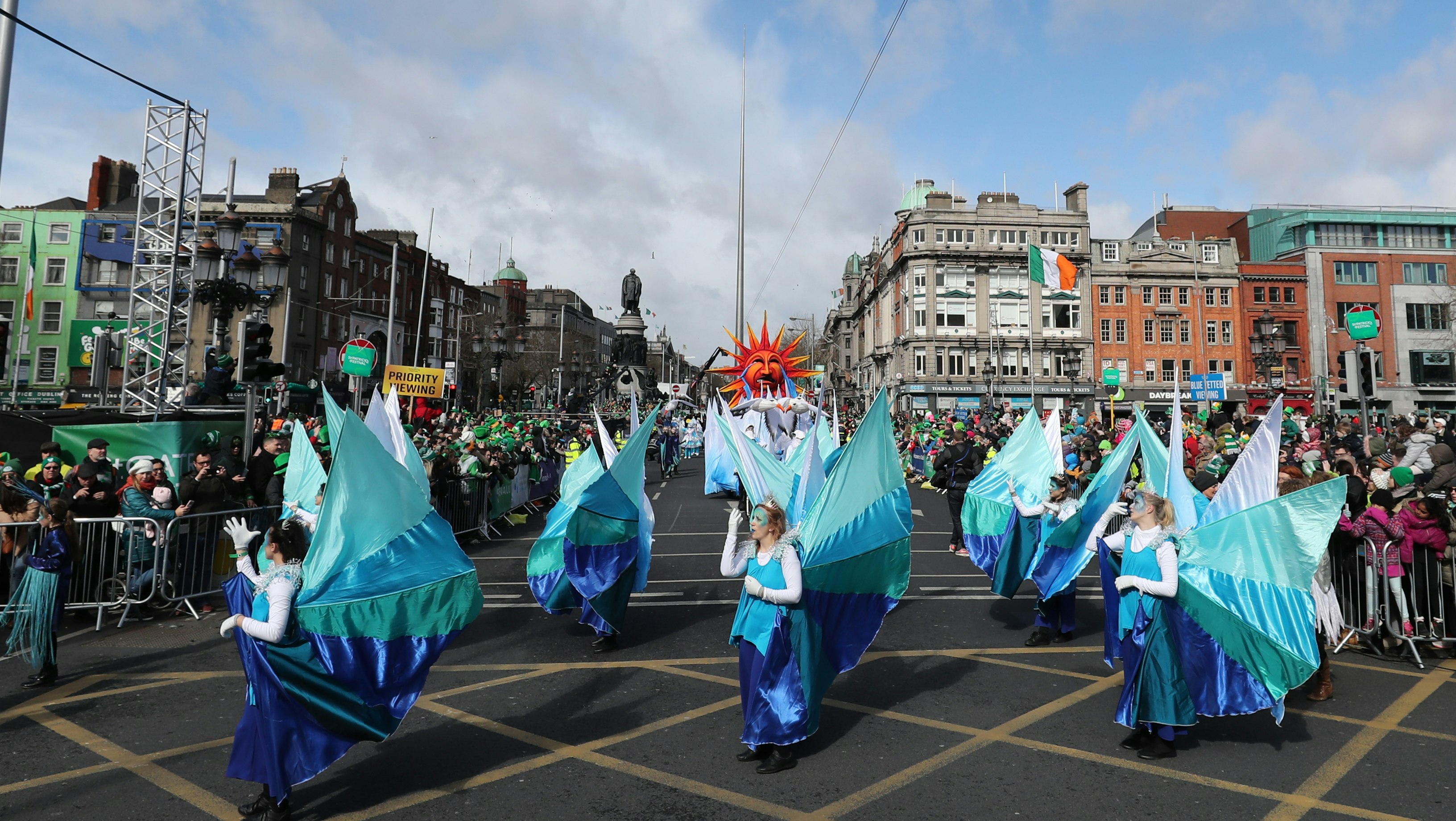 St Patrick's Day Celebration parade in the streets, O'Connell Bridge, Dublin. 