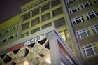 The entrance to the Stasi Museum in House 1 of the former headquarters of the Ministry for State Security of the former German Democratic Republic (GDR) is illuminated in the evening. Burglars have stolen orders and jewellery from the Stasi Museum in Berlin. 