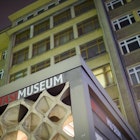 The entrance to the Stasi Museum in House 1 of the former headquarters of the Ministry for State Security of the former German Democratic Republic (GDR) is illuminated in the evening. Burglars have stolen orders and jewellery from the Stasi Museum in Berlin. 