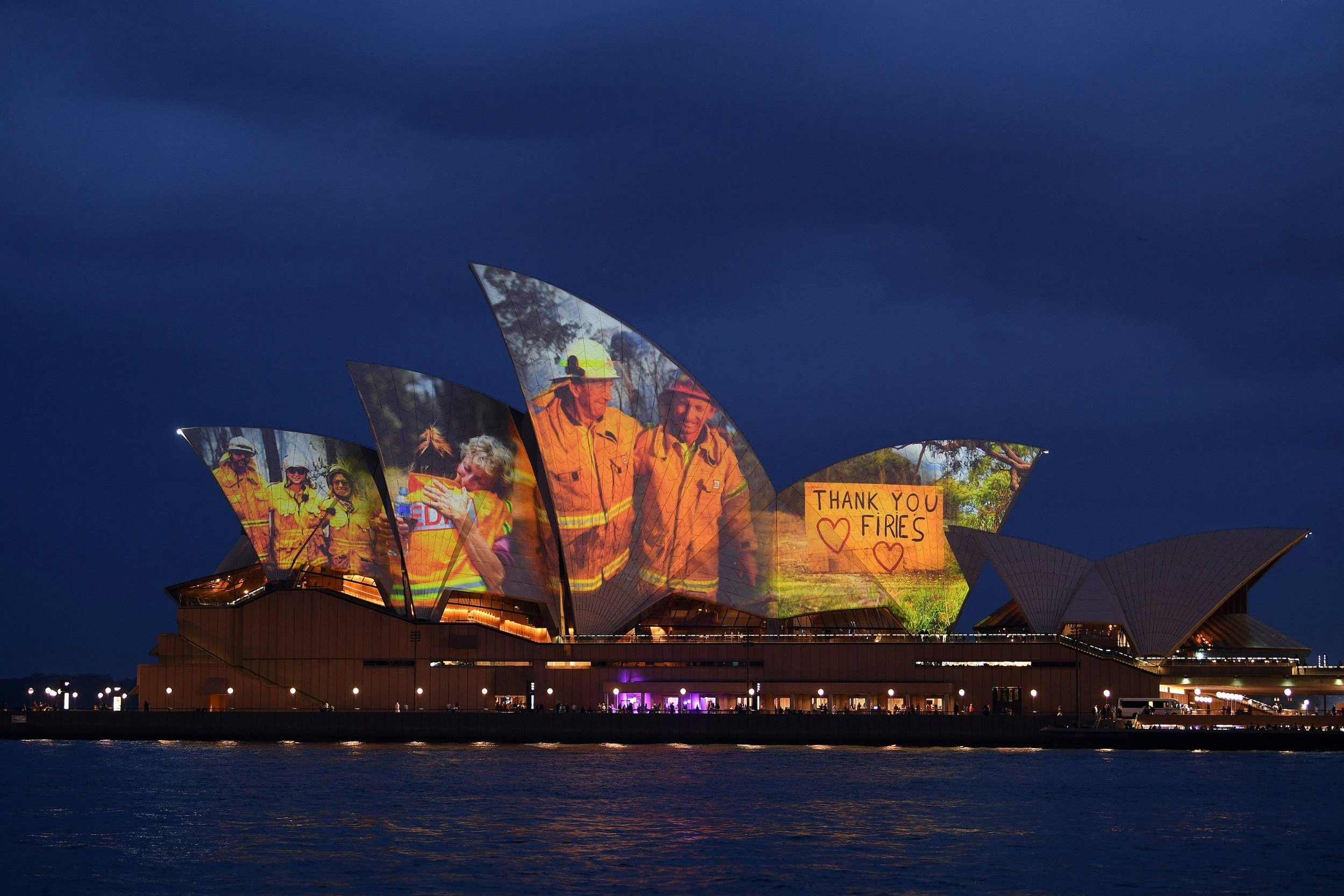 The Sydney Opera House lit up with a tribute to firefighters