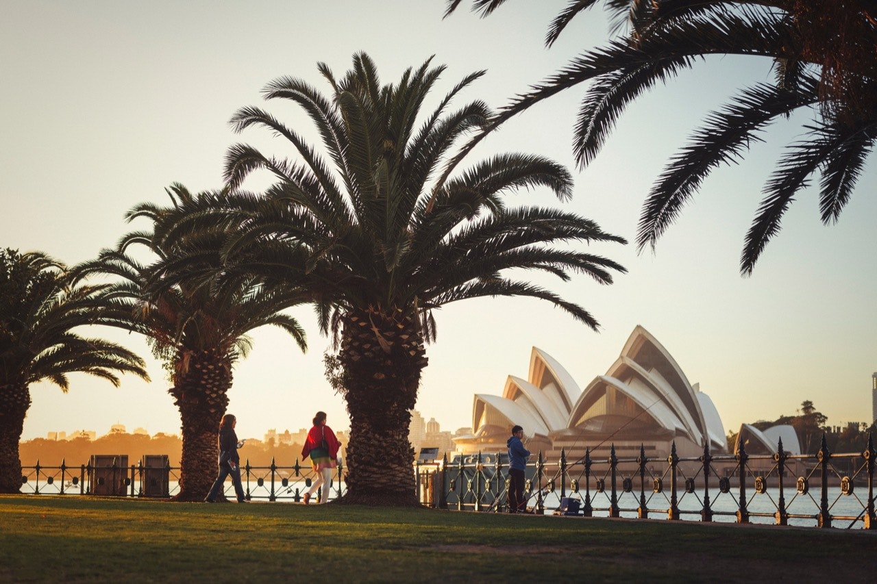 One of the world’s most distinctive buildings, Sydney Opera House, glows in the early morning light.