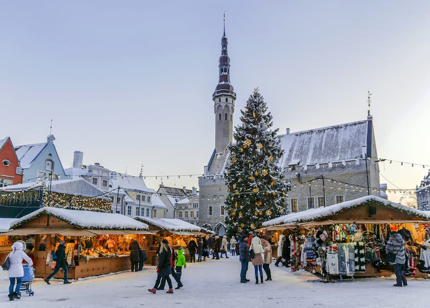 A snow covered Christmas Market in Tallinn's town hall square
