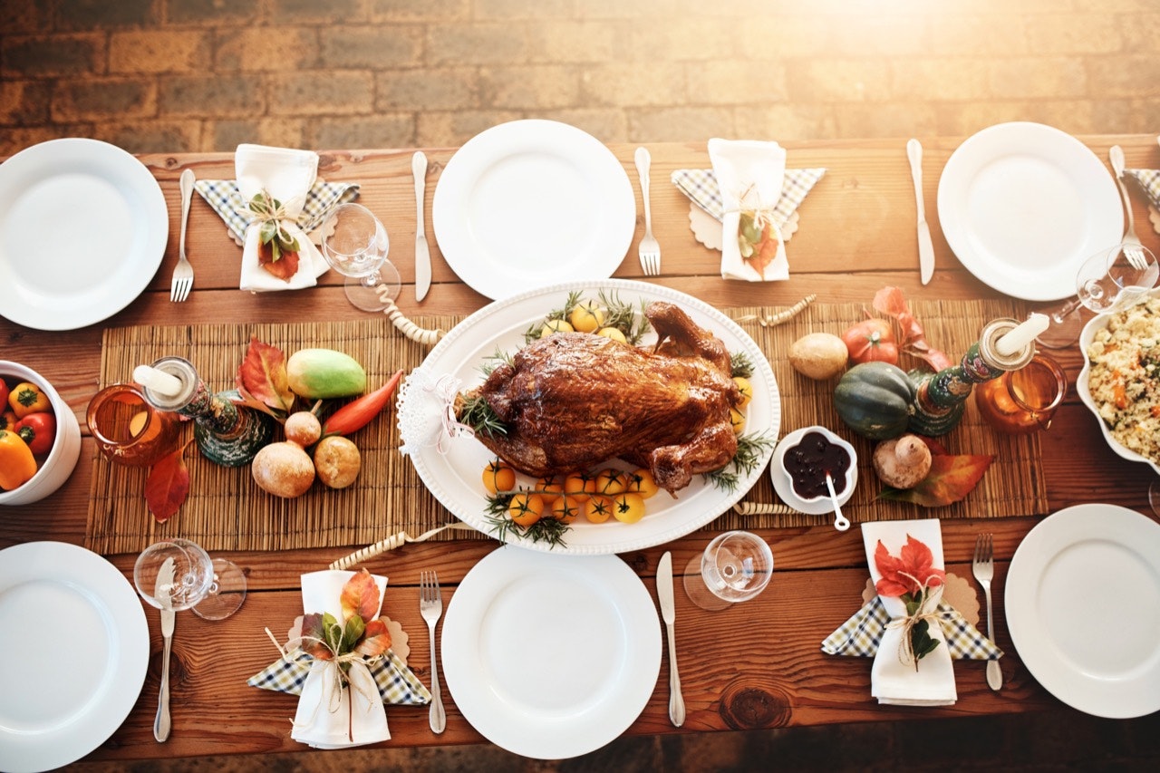 High angle shot of a dining table laid out for Thanksgiving