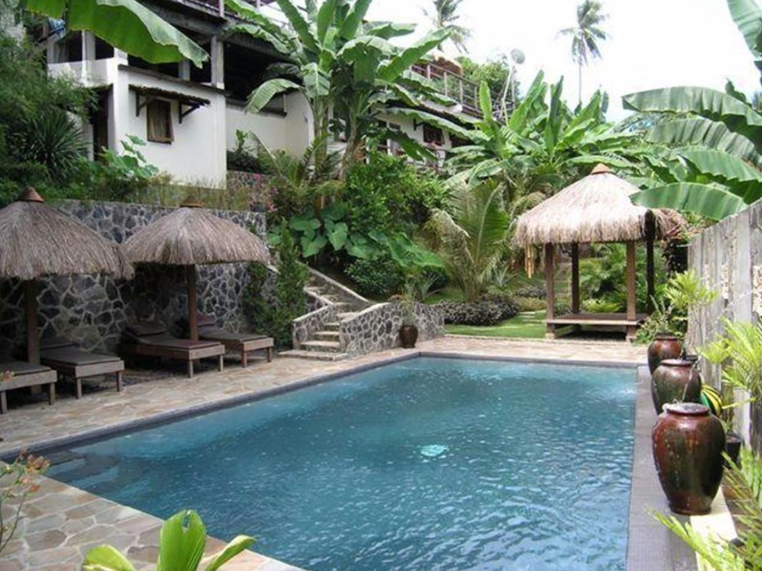Pool area of a guesthouse in Indonesia