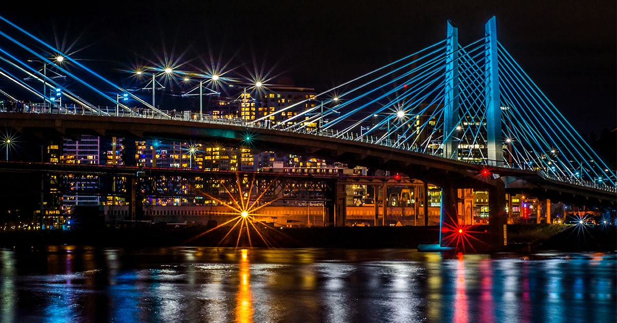  Tilikum Crossing, Bridge of the People spans the Willamette River into downtown Portland.