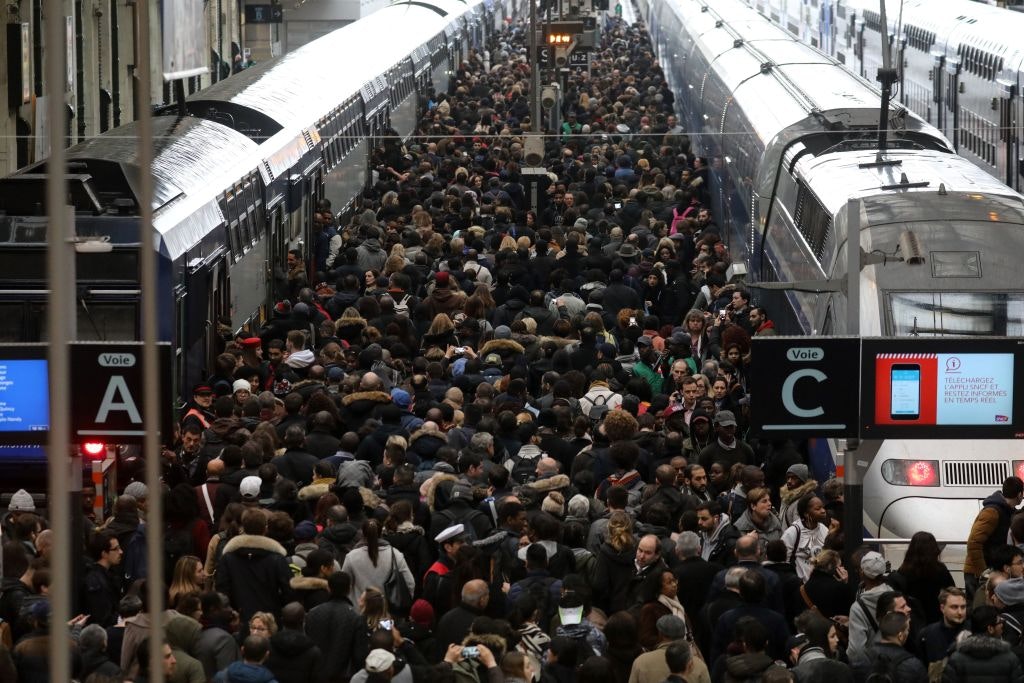 People crowding on a platform during a French train strike
