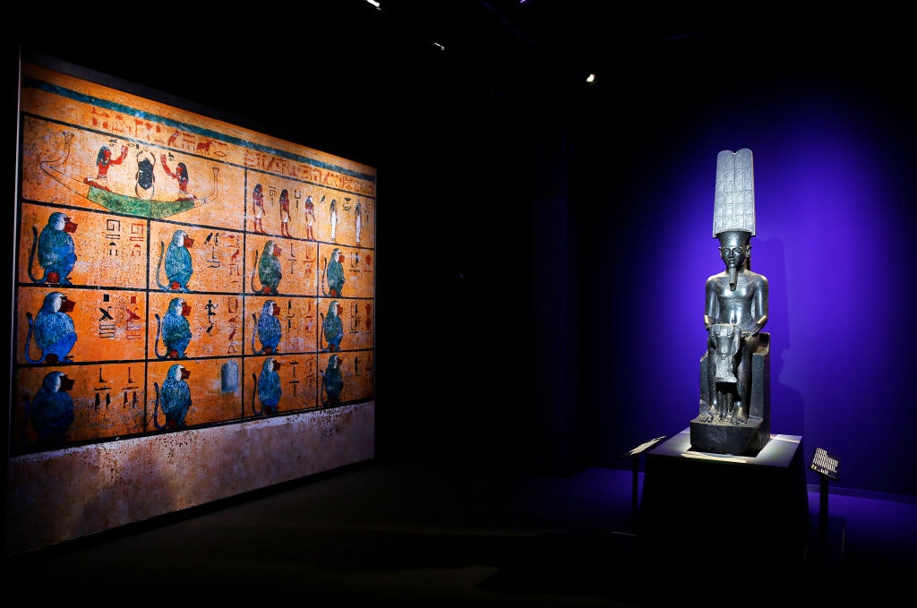 The God Amun protecting Tutankhamun on display in Paris