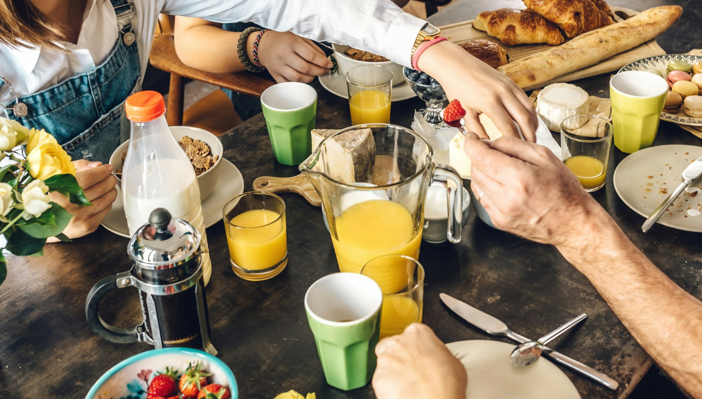 Close up of French family at breakfast table