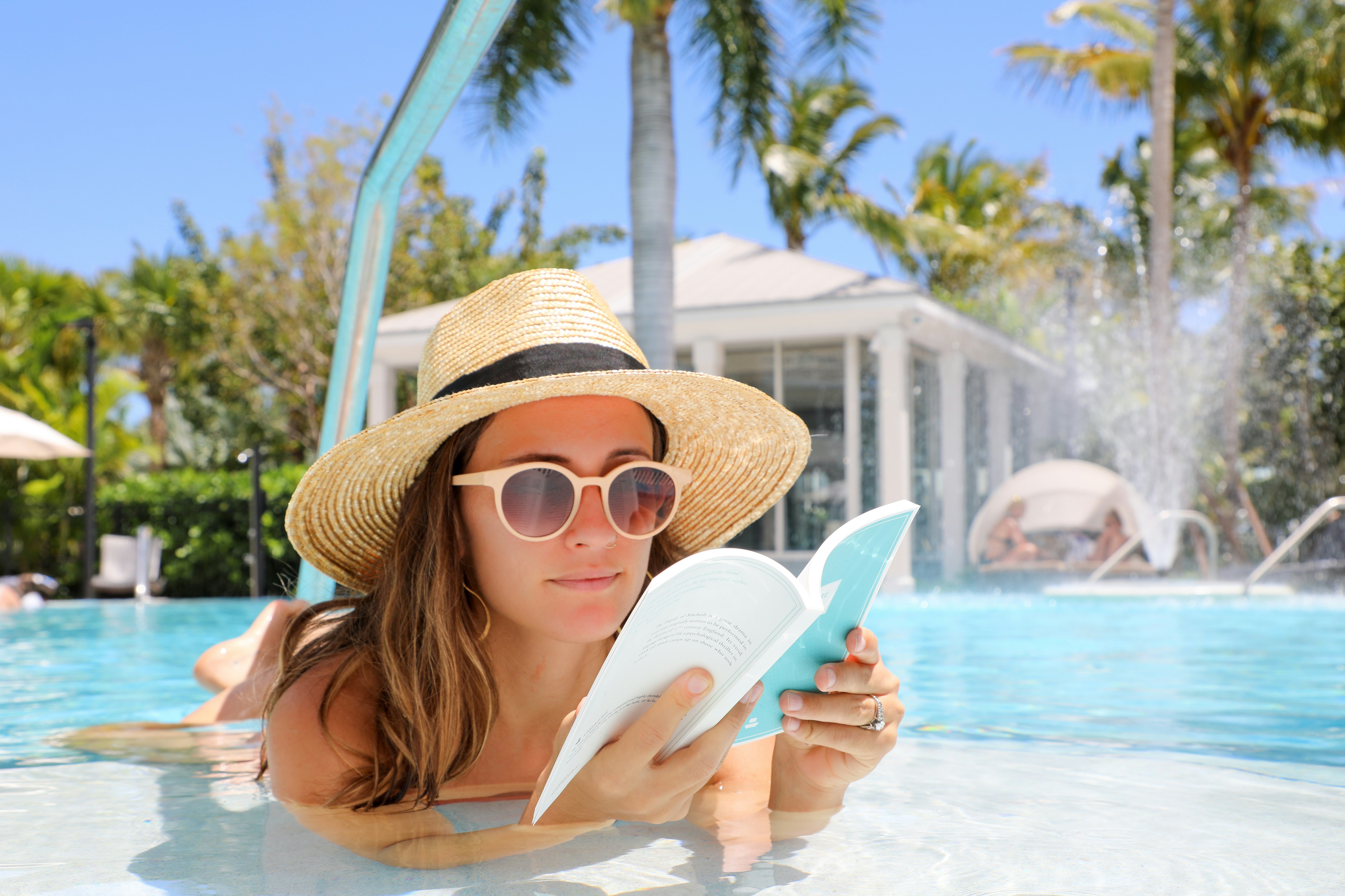 Woman reading in pool.jpg