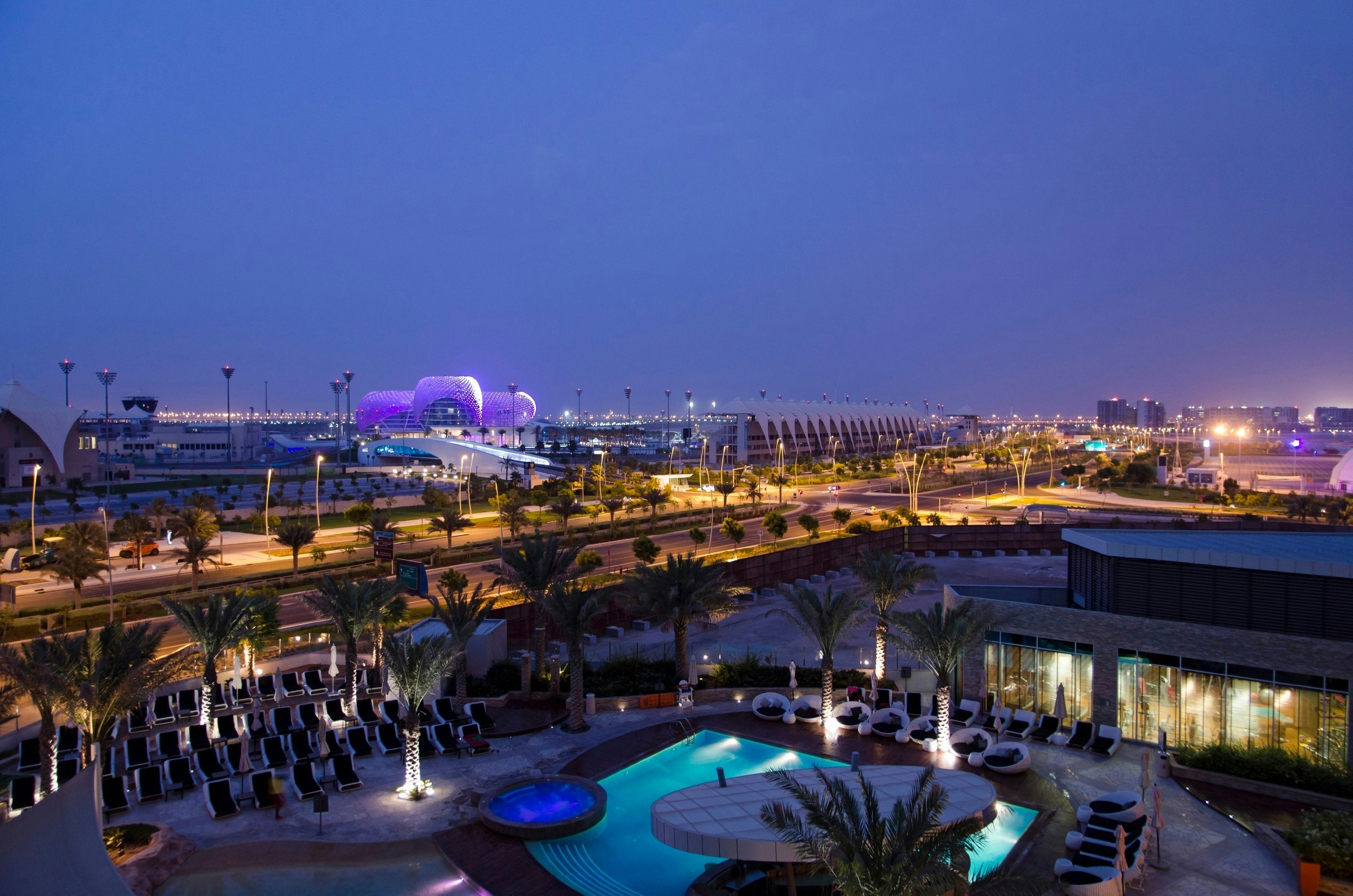 View over modern hotel pool in the Yas island Hotel and Formula 1 circuit in Abu Dhabi