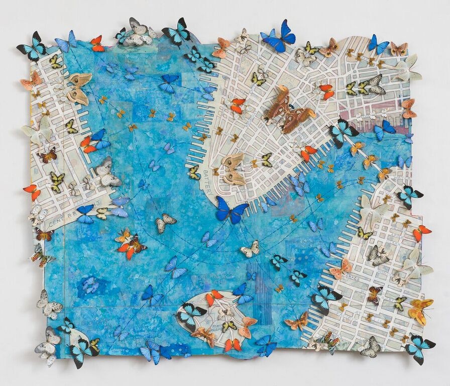 Image of Jane Hammond’s piece 'All Souls (Buttermilk Channel)' (2015). The artwork is a depiction of a map, with a river featuring prominently in bright blue, while colorful paper butterflies are shown on migratory pathways.