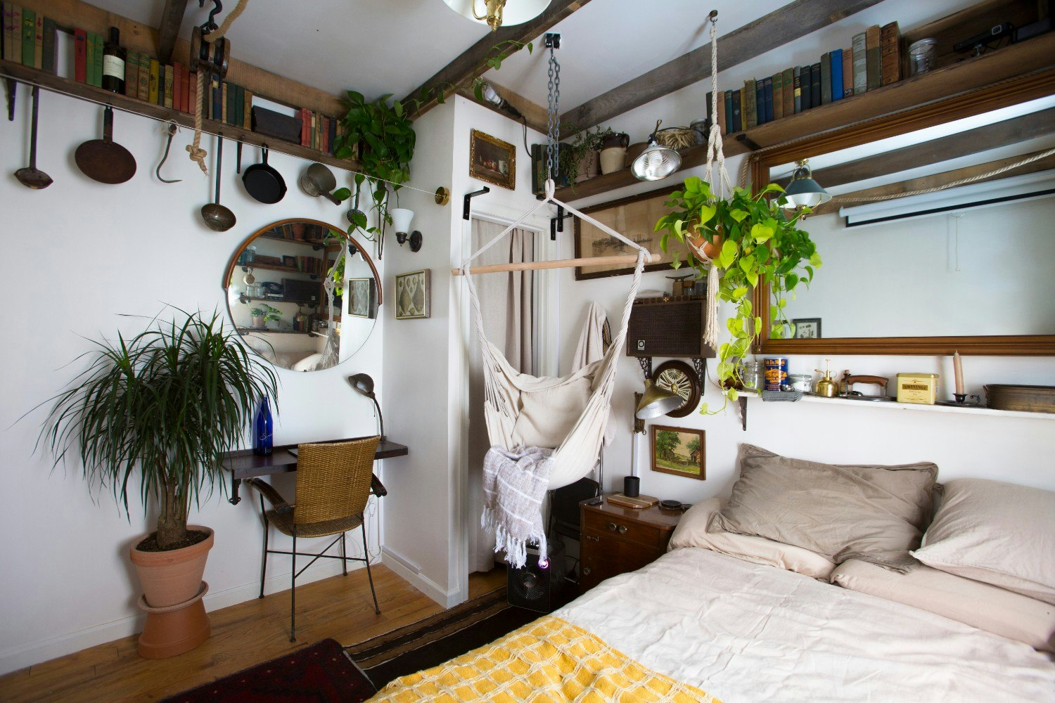 An Airbnb bedroom with plants in Brooklyn