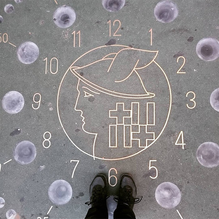 Clock engravings on the ground of Via Laietana, Barcelona