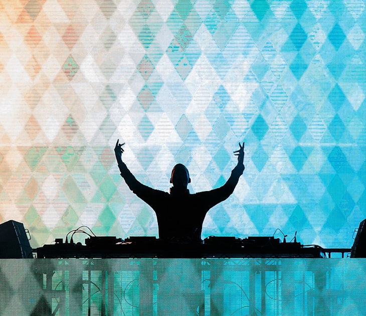 dj with hands up editorial only_crop.jpg