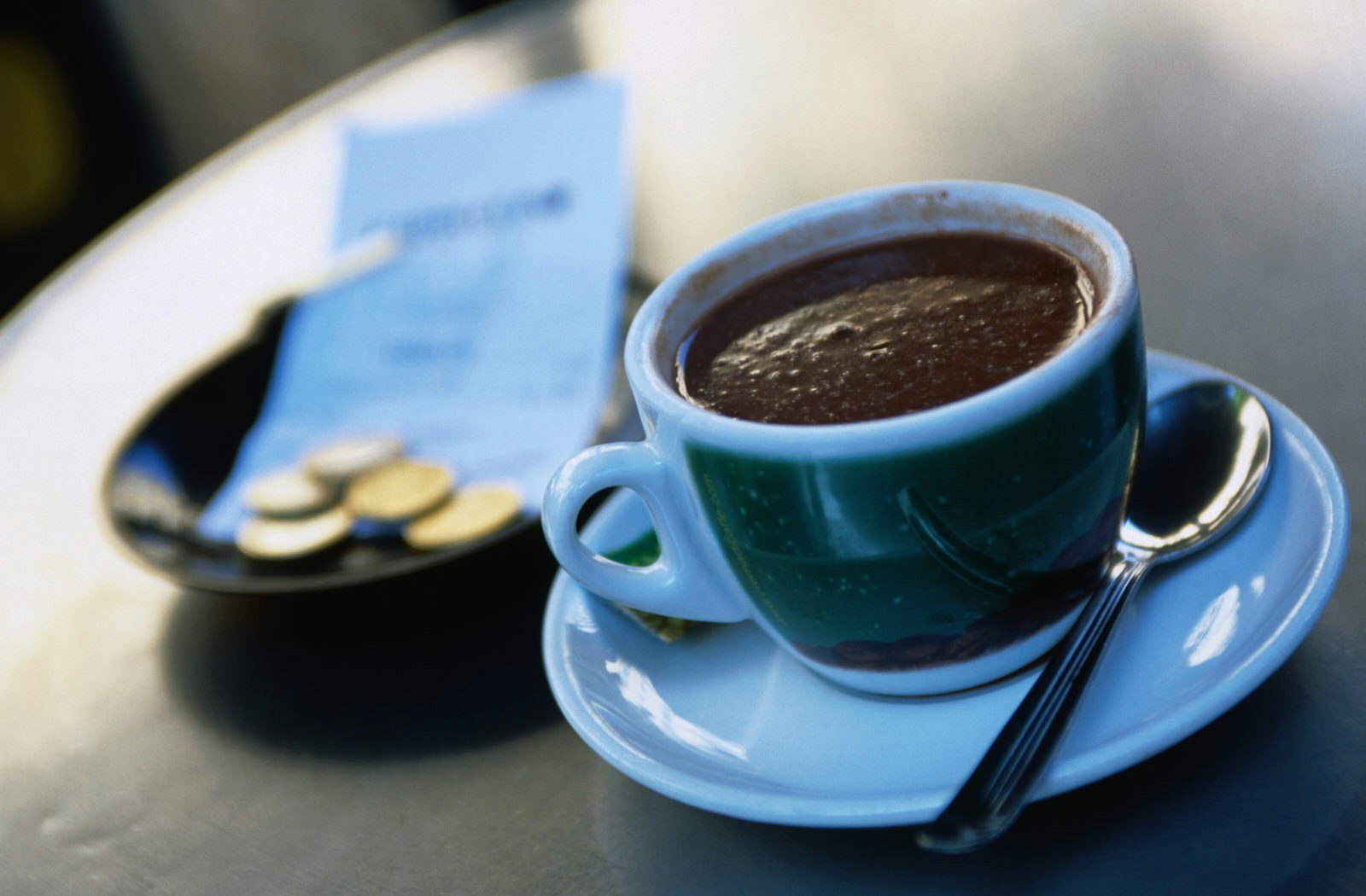 Hot chocolate on a cafe table in Spain 