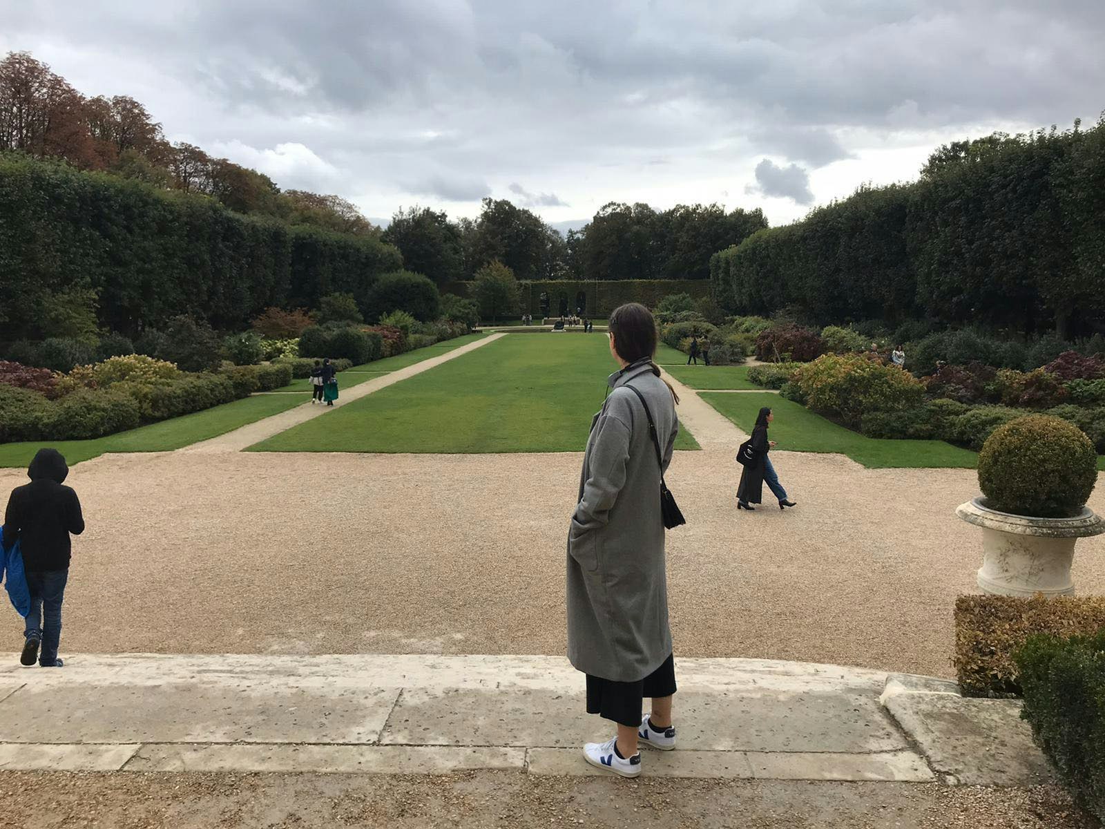 The author looks out onto the museum's manicured gardens 