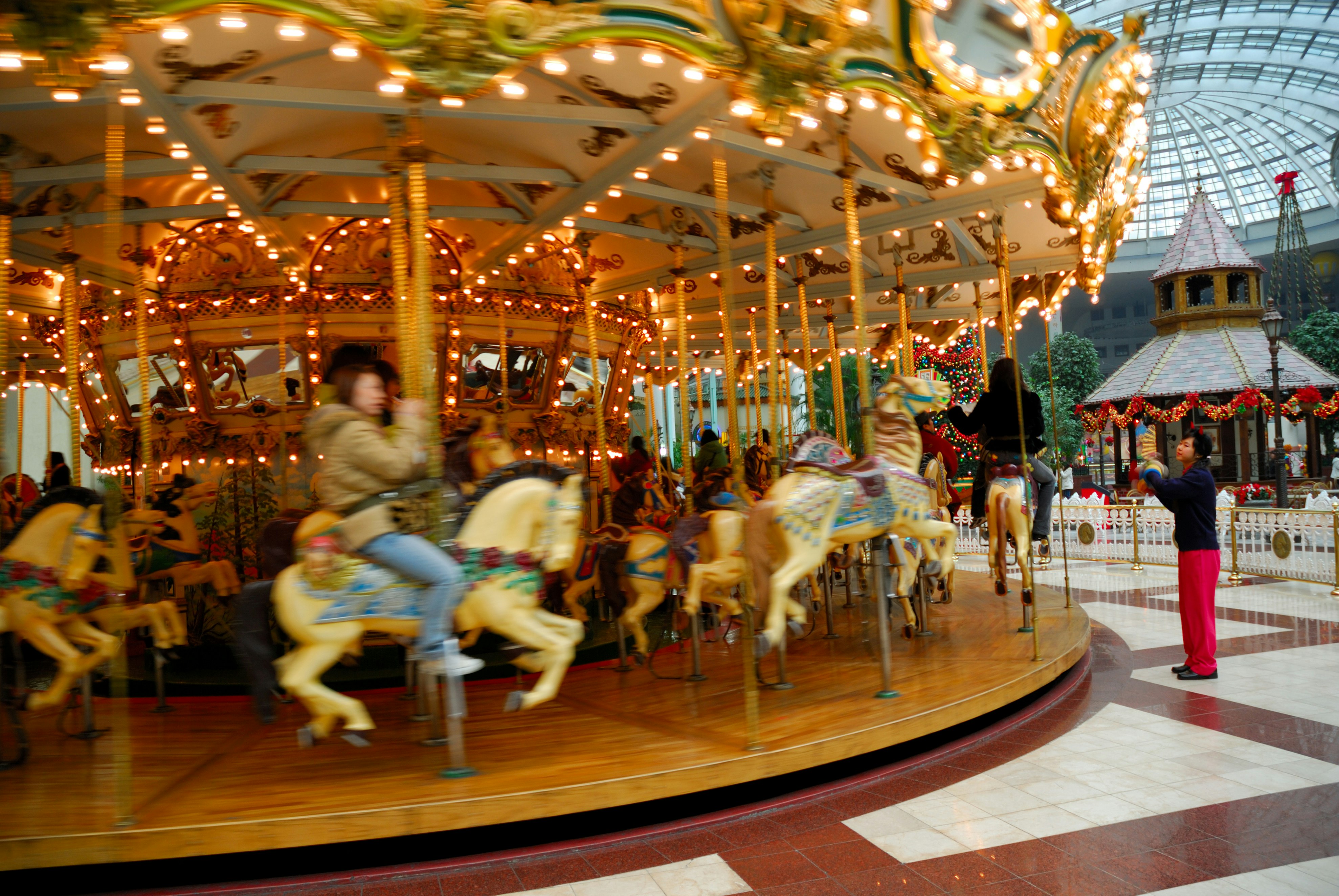 A shot of the carousel at the amusement park Lotte World.