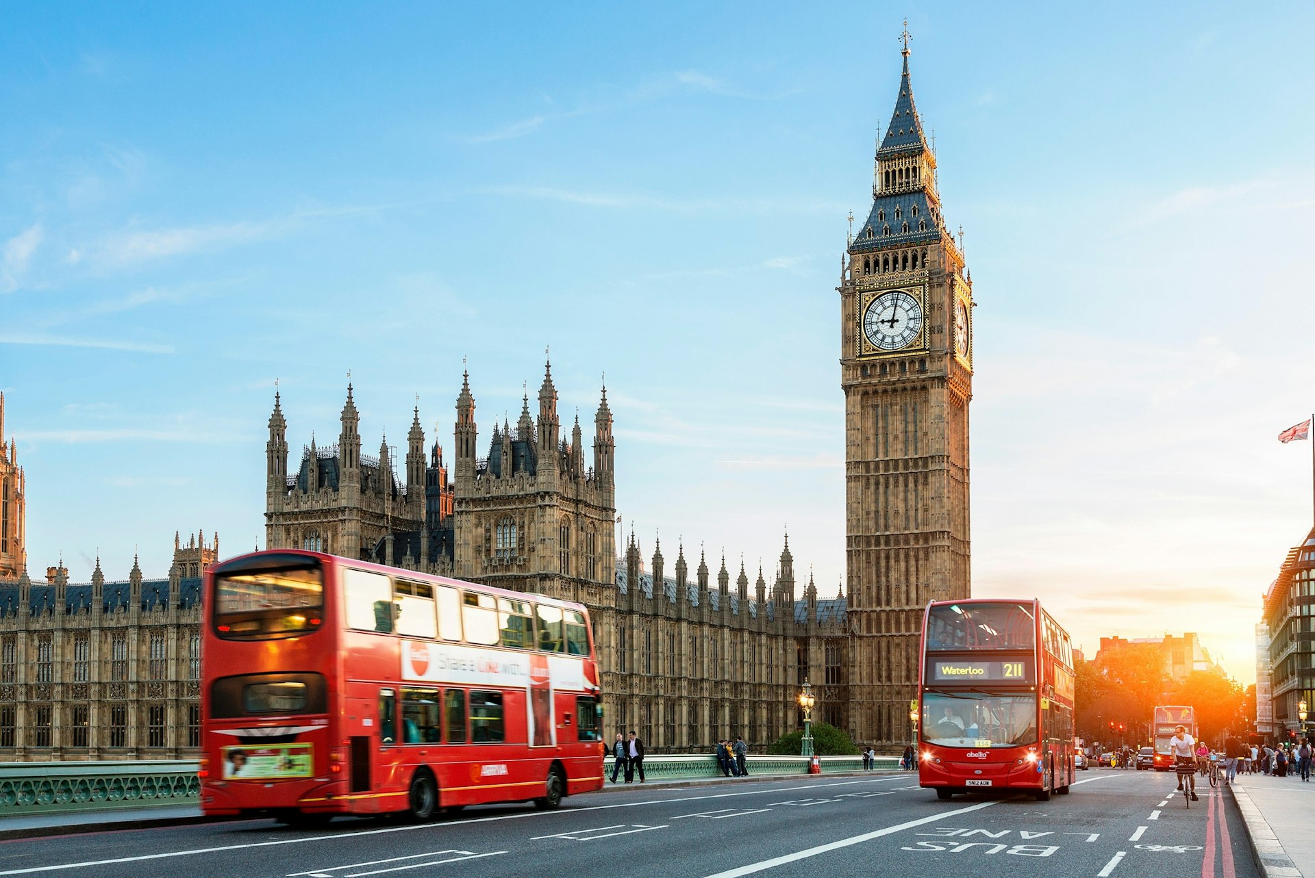 Double-decker buses on Westminster Bridge with Big Ben in the background