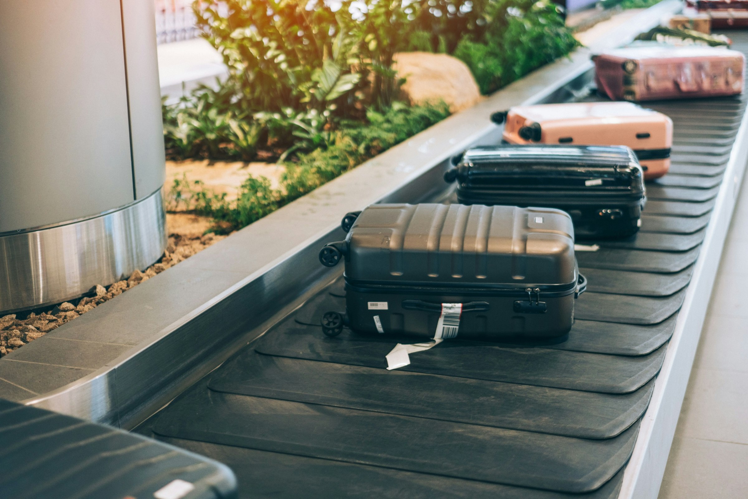 Luggage on a conveyor belt at an international airport