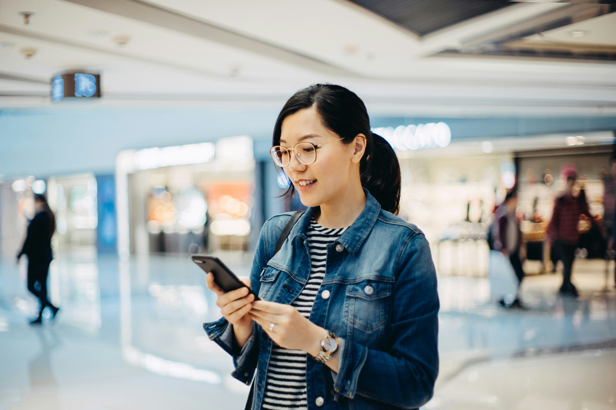 A young woman using her smartphone