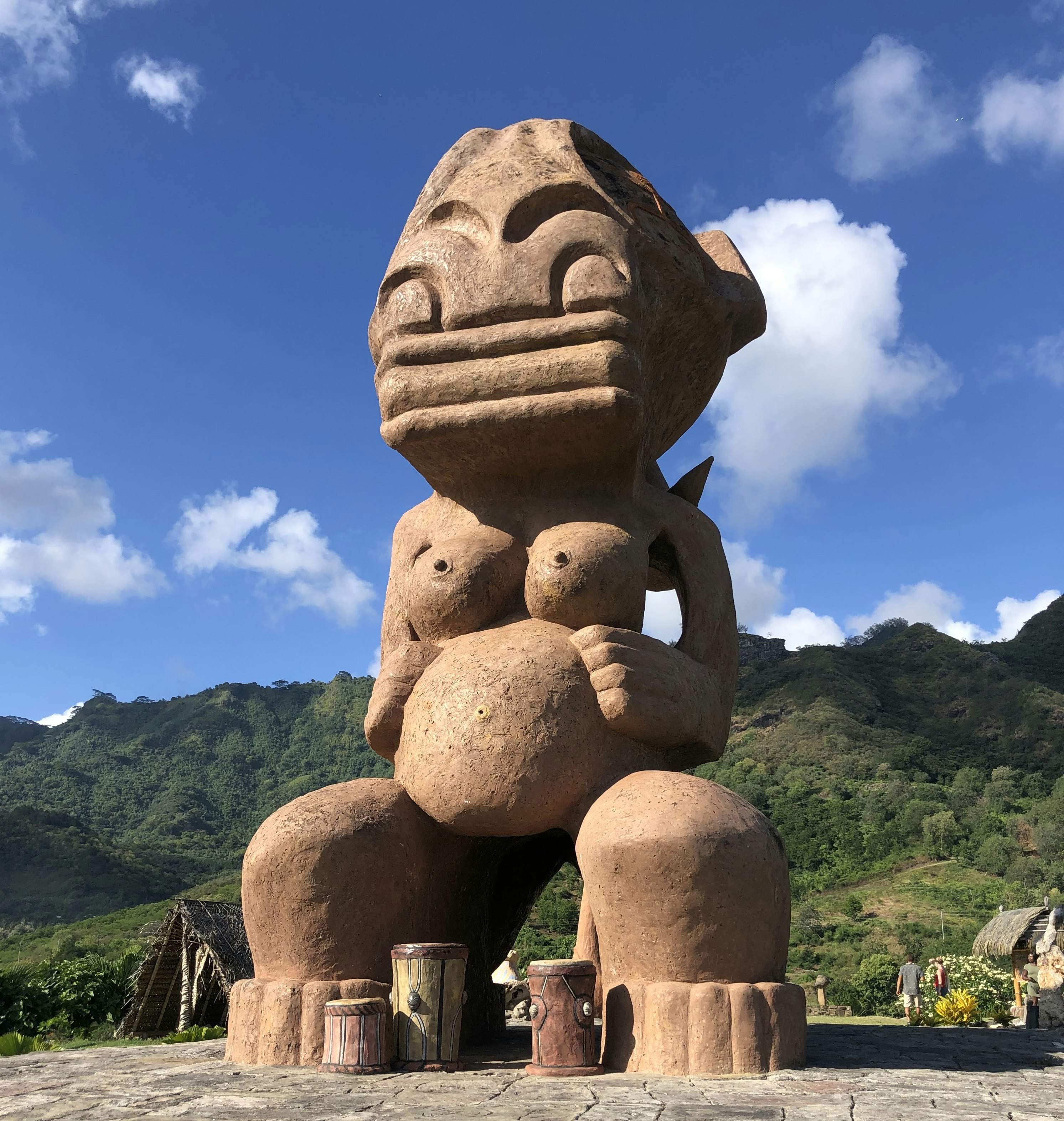 A huge wooden statue dominates the skyline in Nuku Hiva