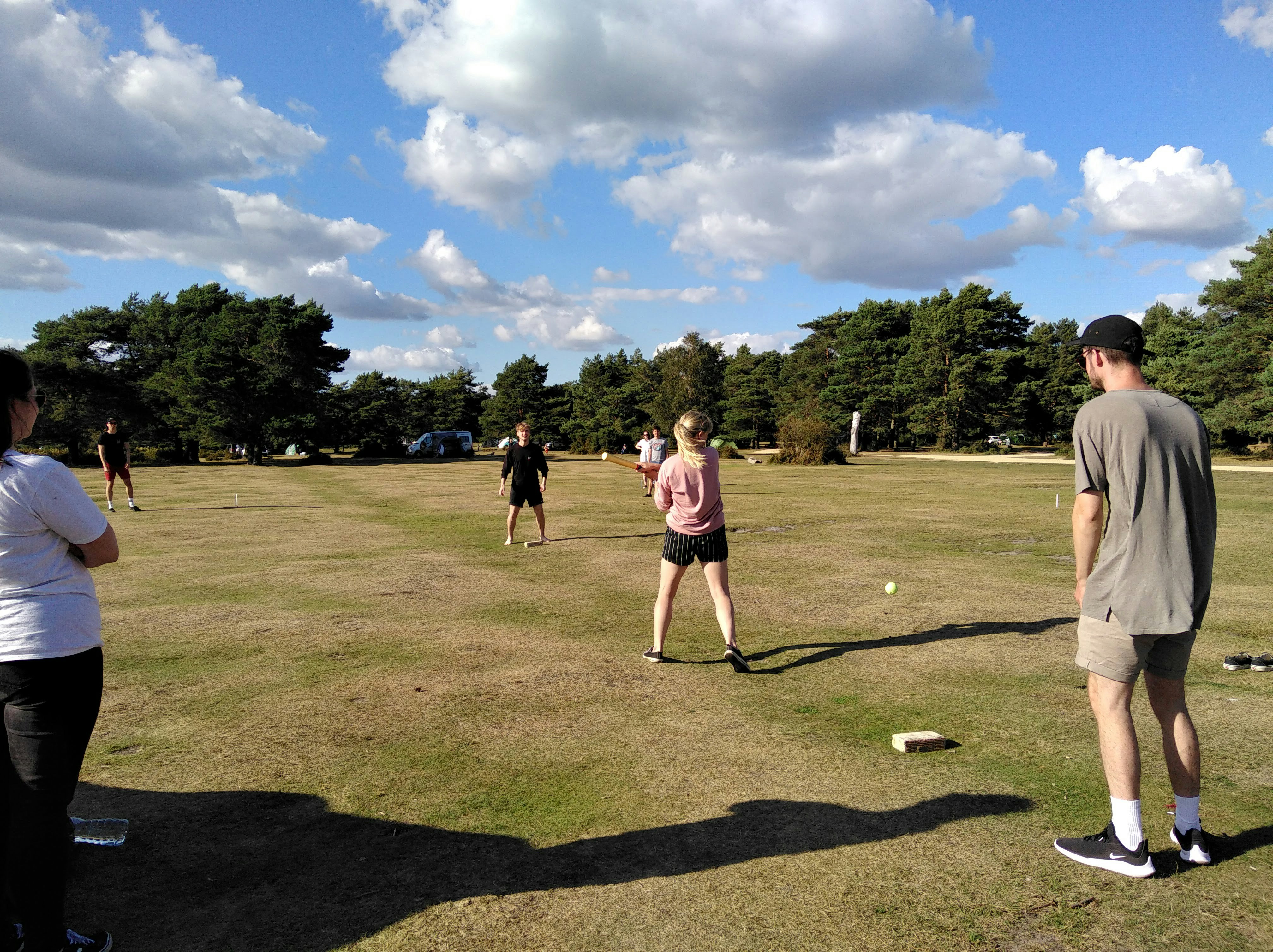 The group play rounders on a sunny day. New Forest spending diary