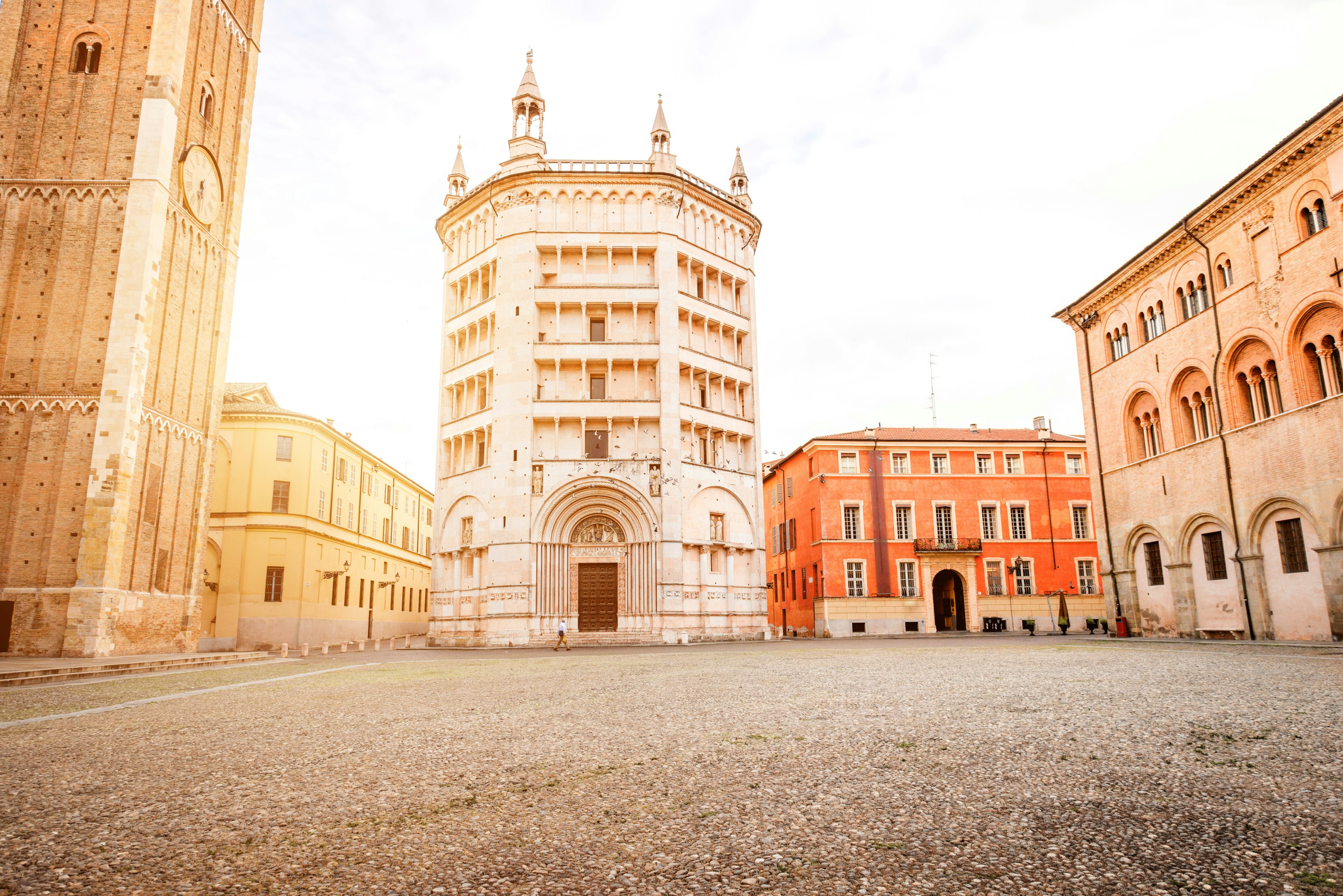 Parma cathedral with Baptistery leaning tower on the central square in Parma town in Italy.
