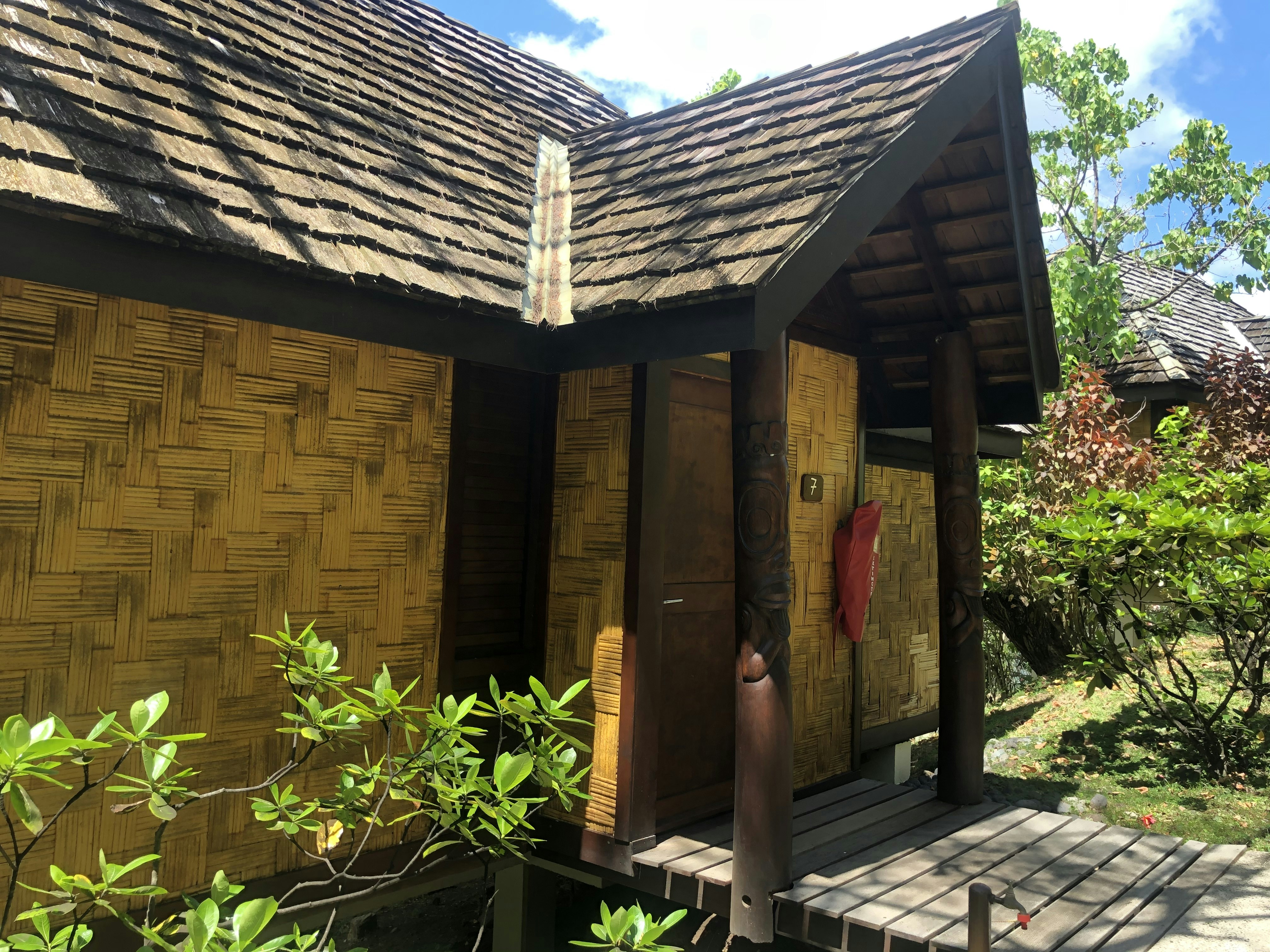 The wooden door of a bungalow at the Pearl Lodge resort