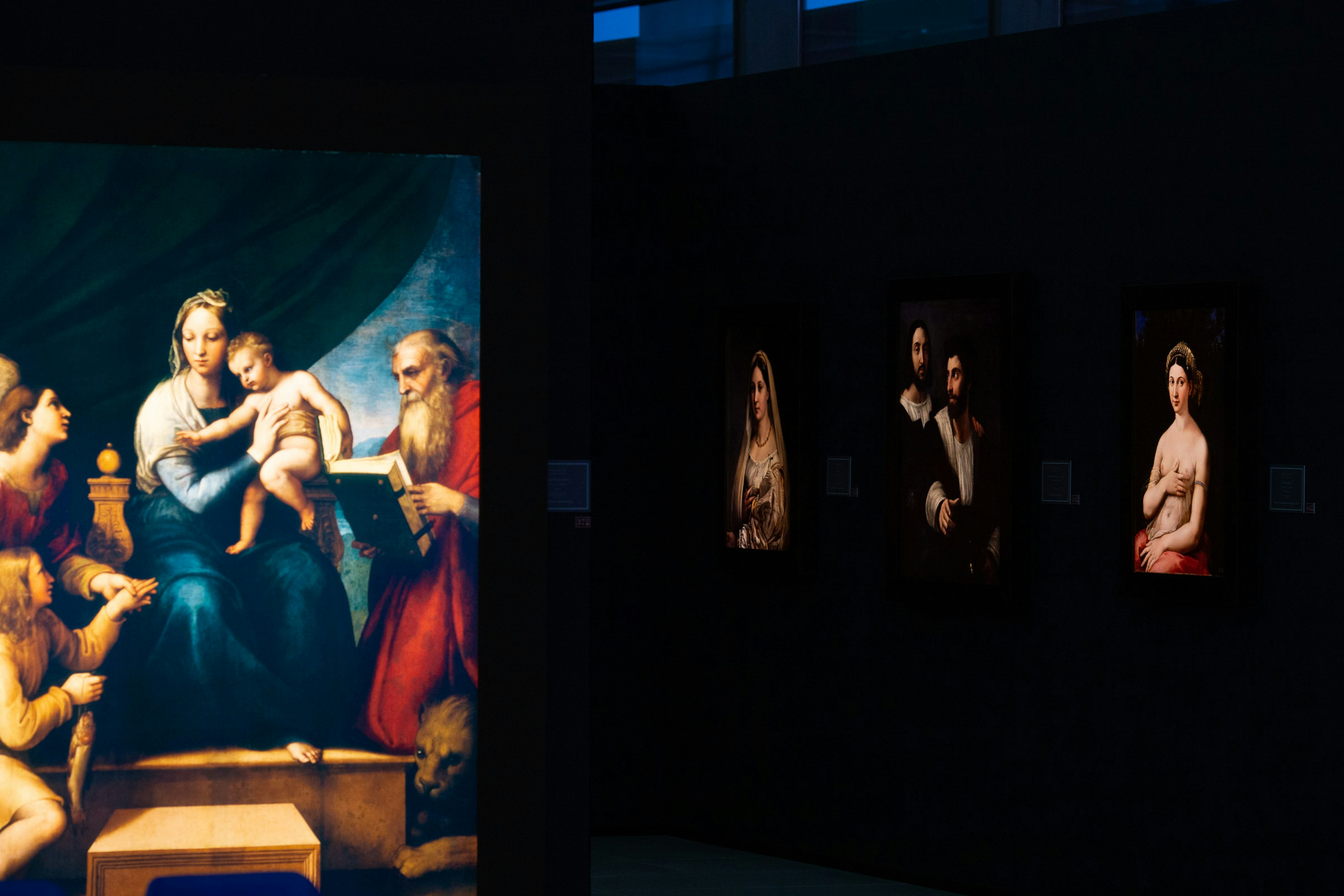 A picture of some of the reproductions featured in the exhibition against a black background