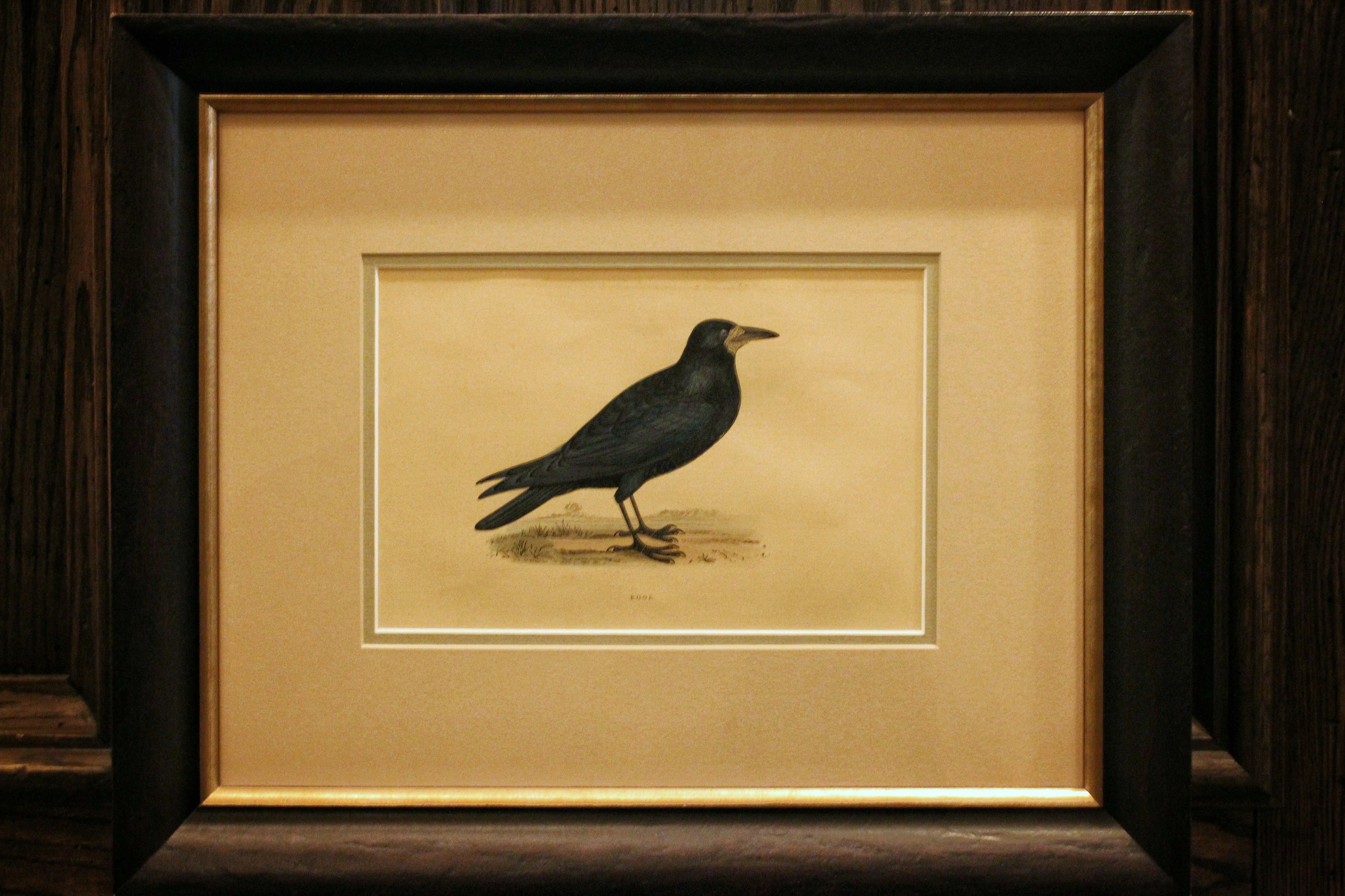 A framed sketch of a raven at The Beekman.