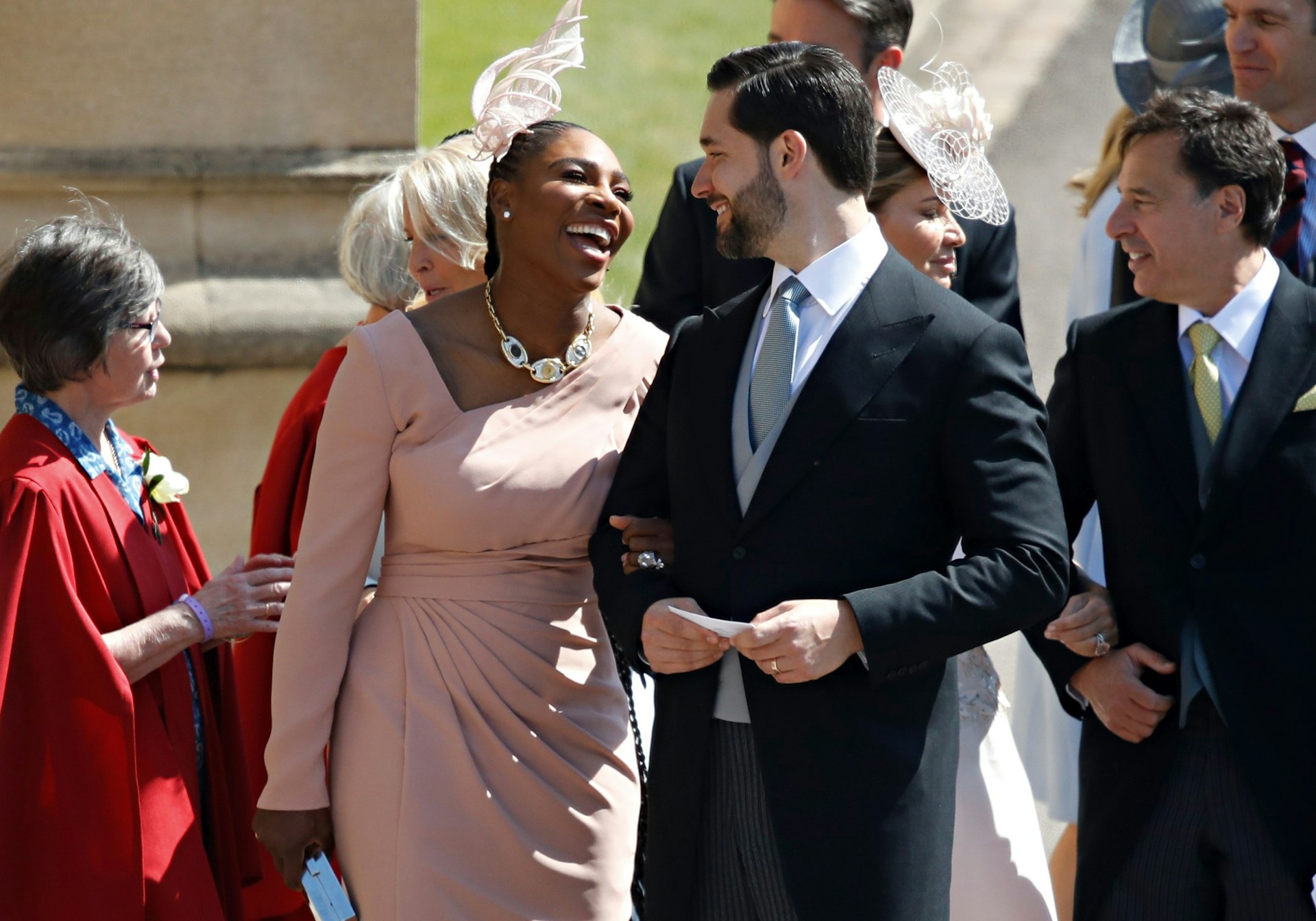 Serena Williams and her husband Alexis Ohanian are pictured smiling at the wedding of Prince Harry and Meghan Markle.