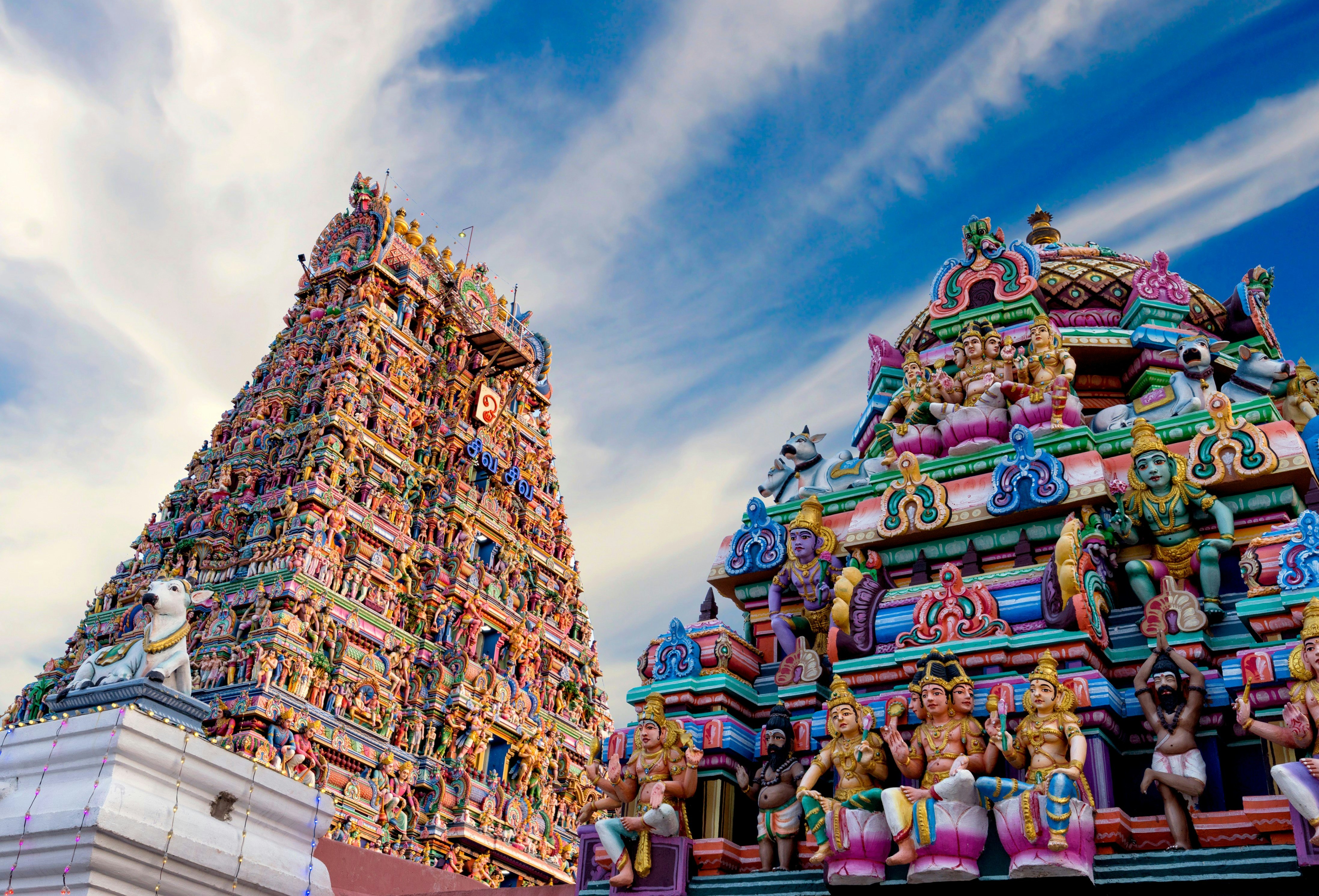 The eye-catching, colourful gopura at the Hindu Kapaleeshwarar Temple in Chennai. The temple's tower is covered in hundreds of sculptures of Hindu deities, all painted in bright colours.