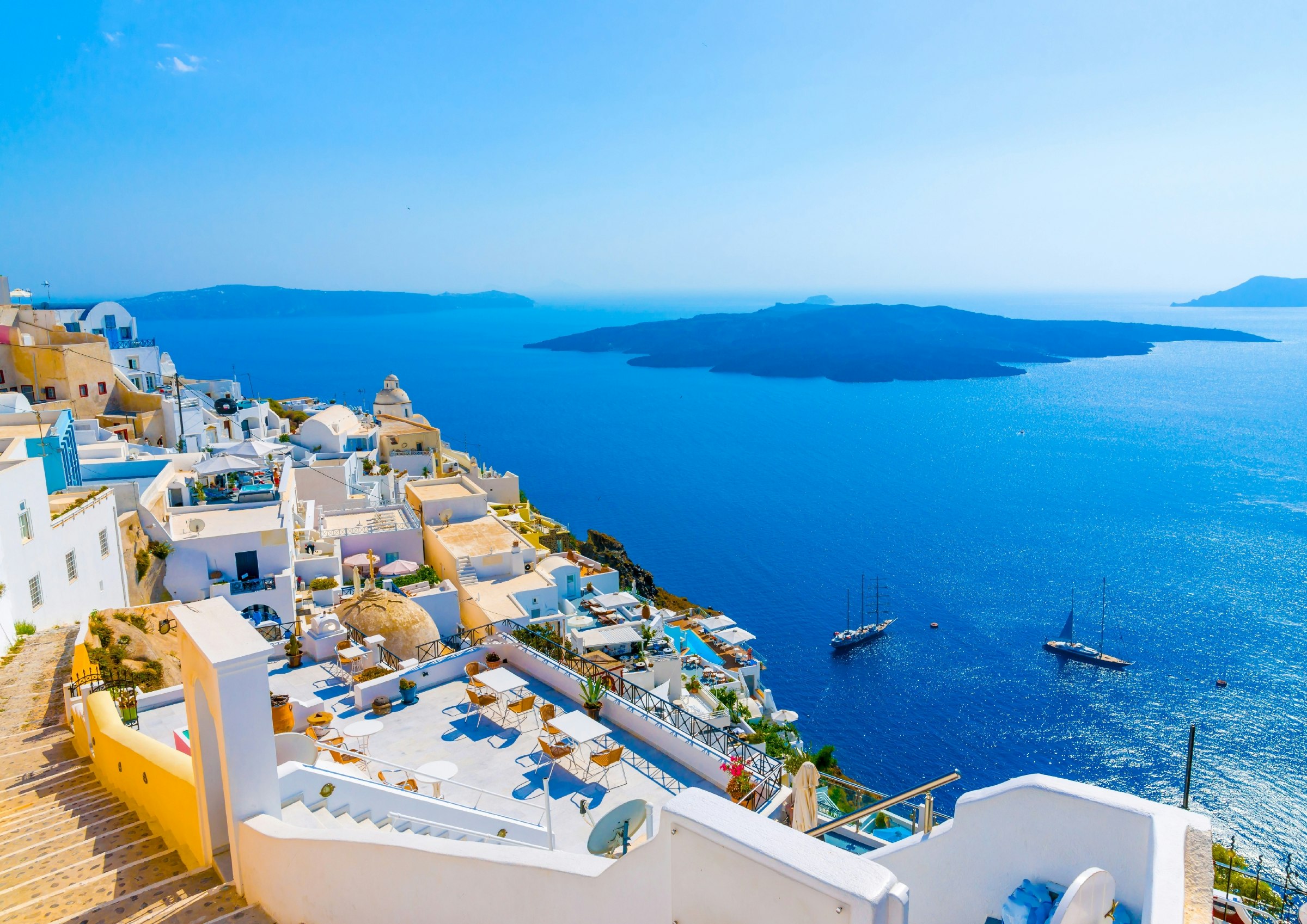 View to the sea and Volcano from Fira, the capital of Santorini in Greece